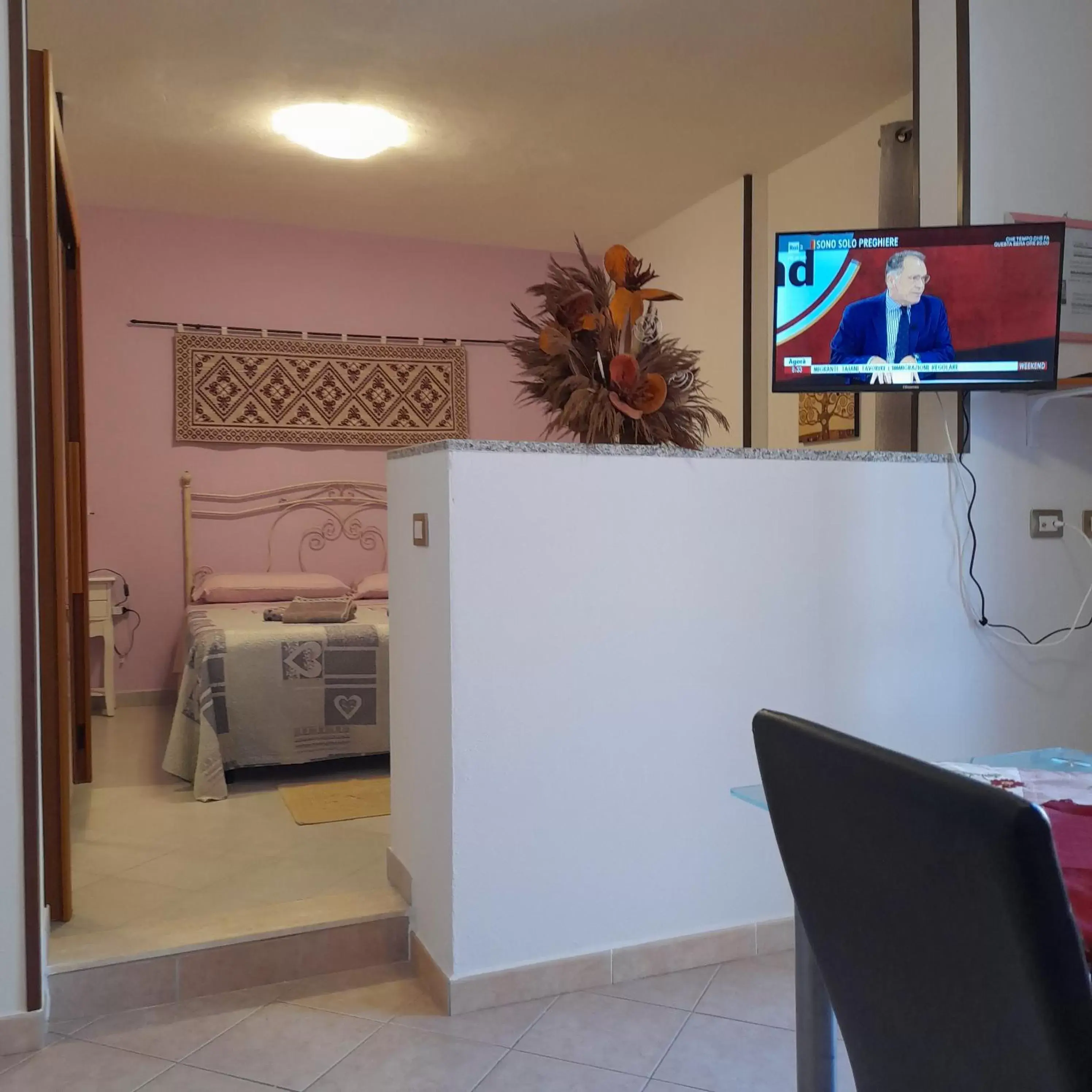 Photo of the whole room, TV/Entertainment Center in La Fortezza casa vacanze & appartament