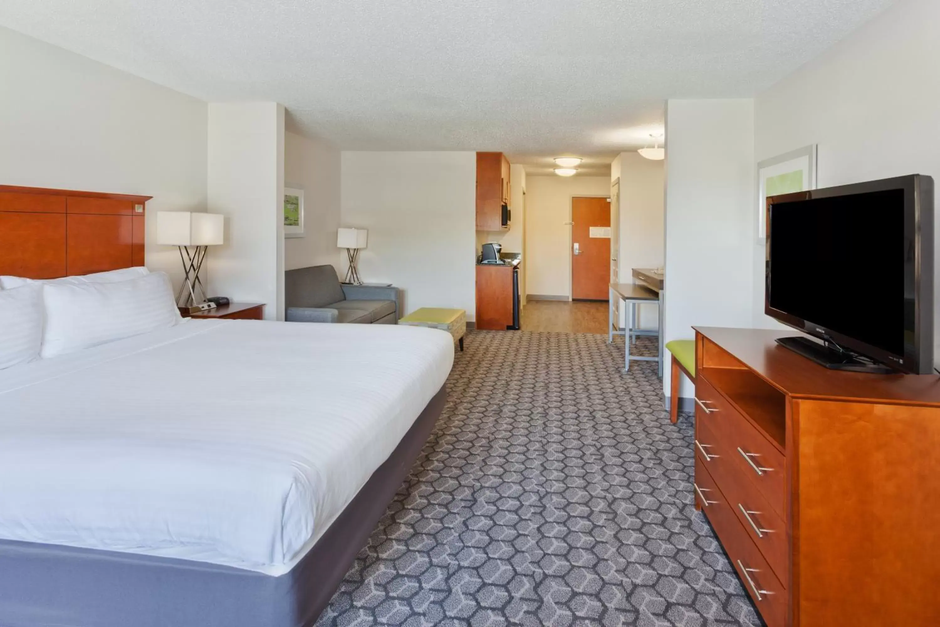 Photo of the whole room, TV/Entertainment Center in Holiday Inn Express Phenix City-Fort Benning, an IHG Hotel