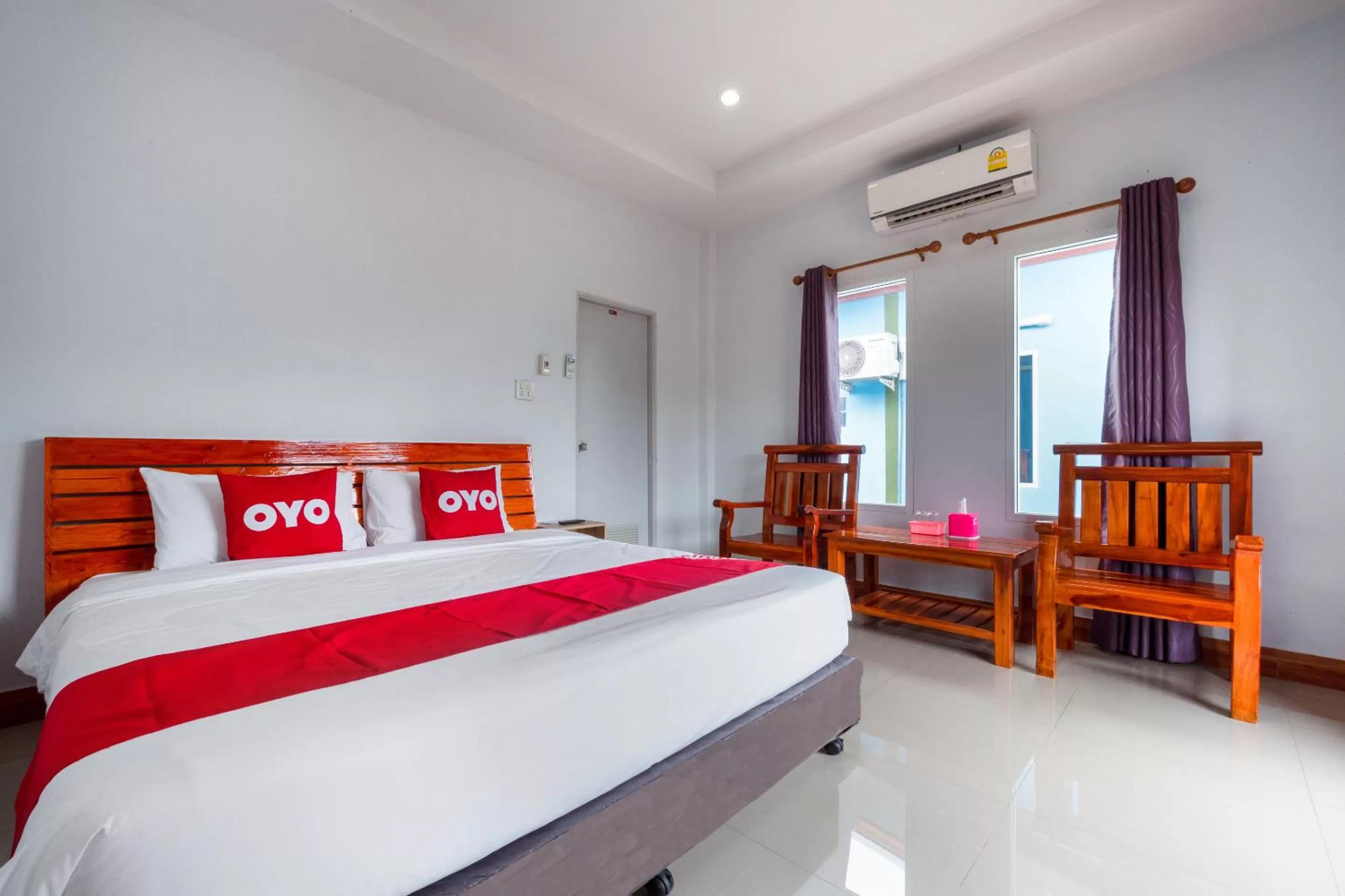 Bedroom in OYO 1044 Vassana Resort
