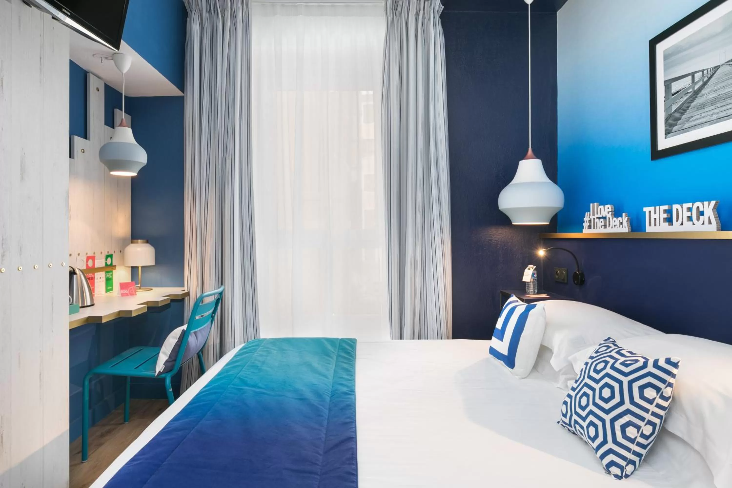 Bedroom, Bed in The Deck Hotel by Happyculture