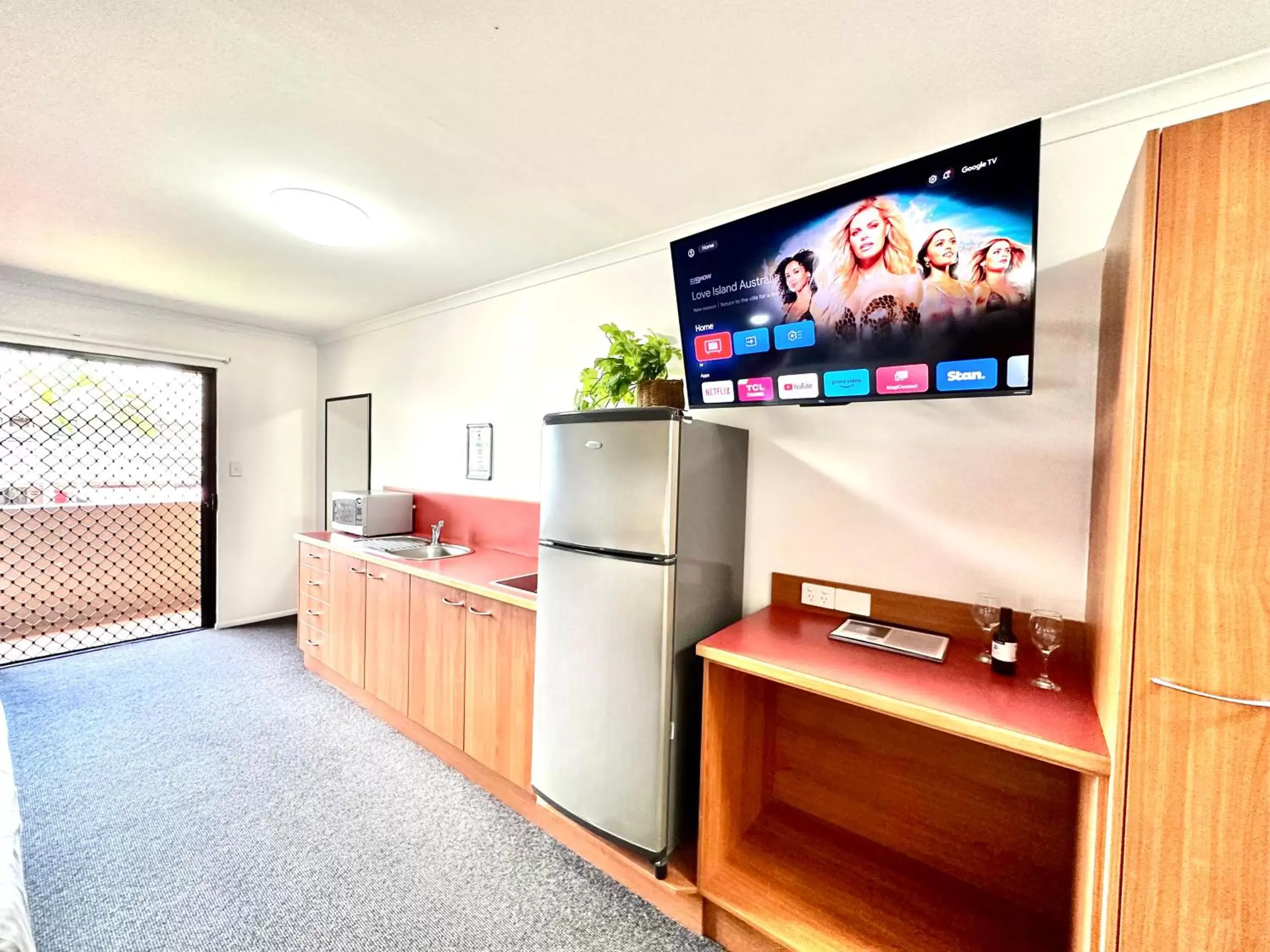 TV and multimedia, TV/Entertainment Center in Mackay Resort Motel