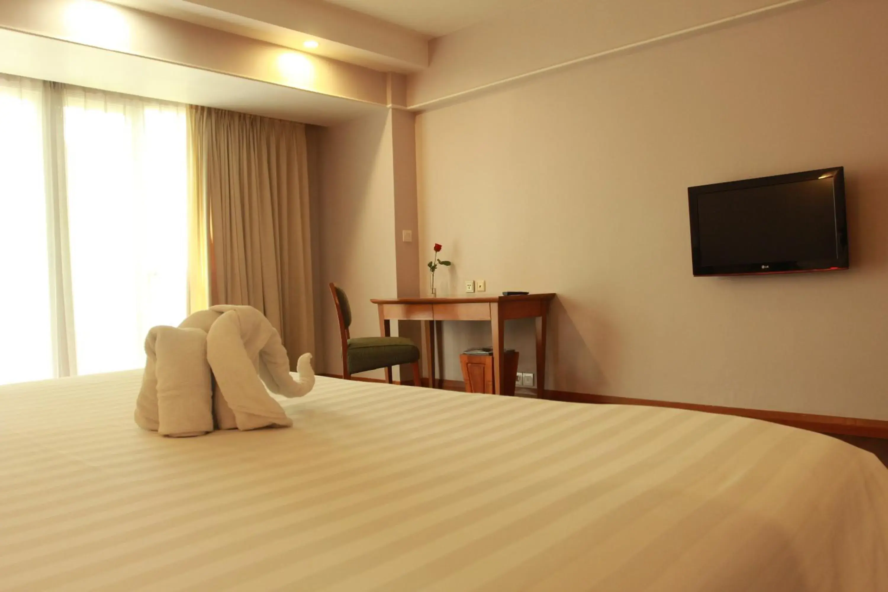 Bed in Novotel Surabaya Hotel