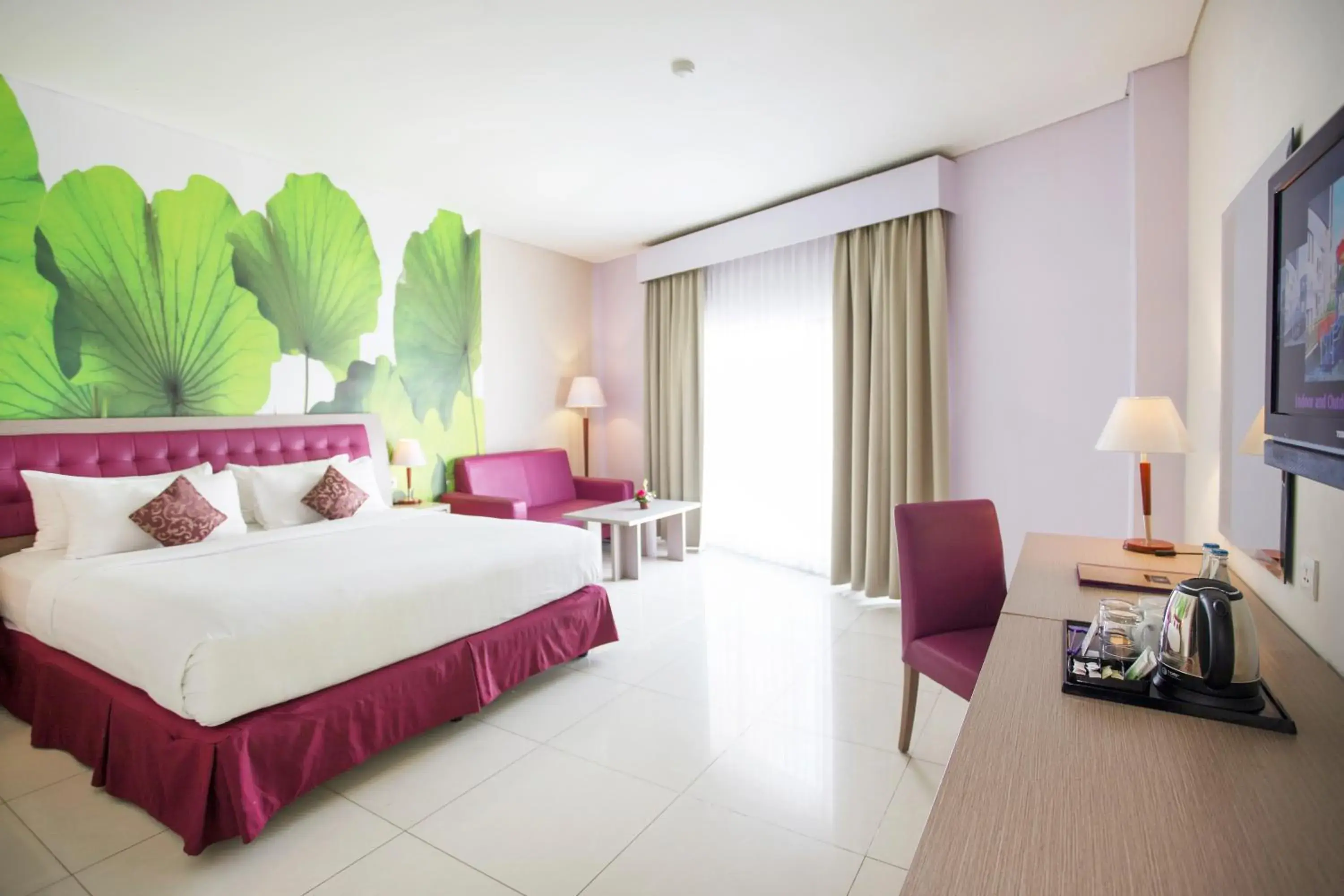 Bed in Kuta Central Park Hotel