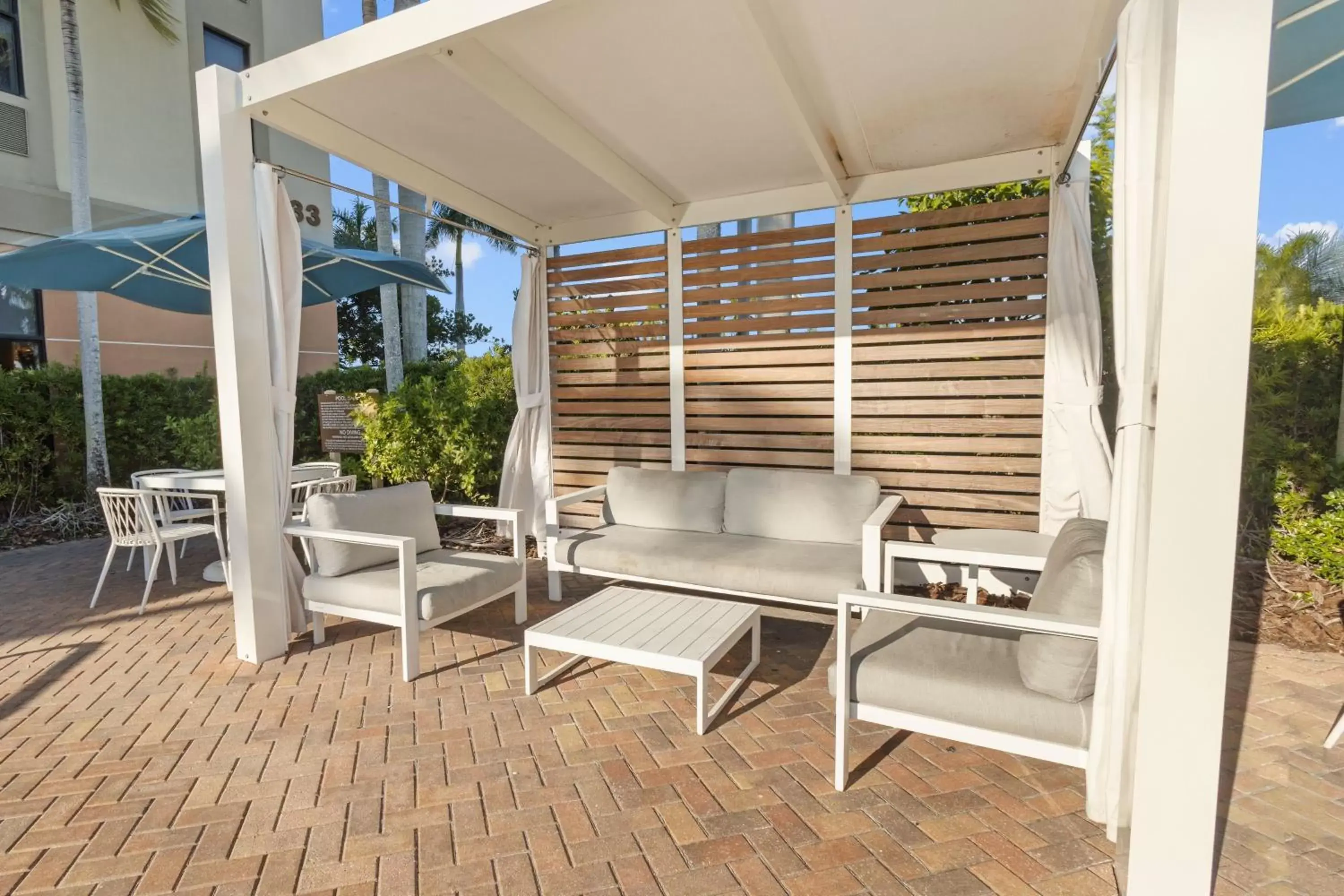 Swimming pool, Seating Area in Four Points By Sheraton Punta Gorda Harborside