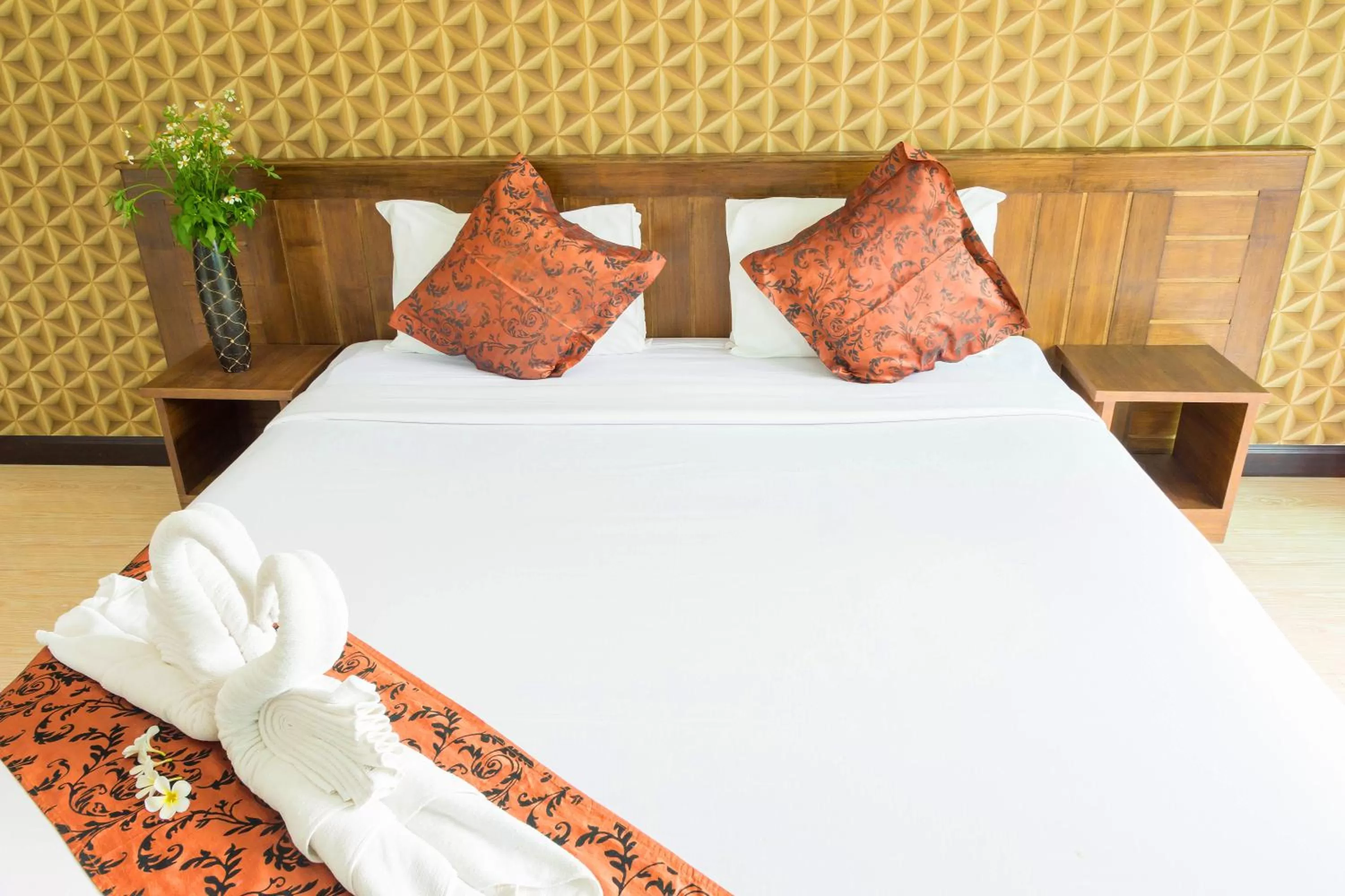 Bed in Baannai Lake View Resort