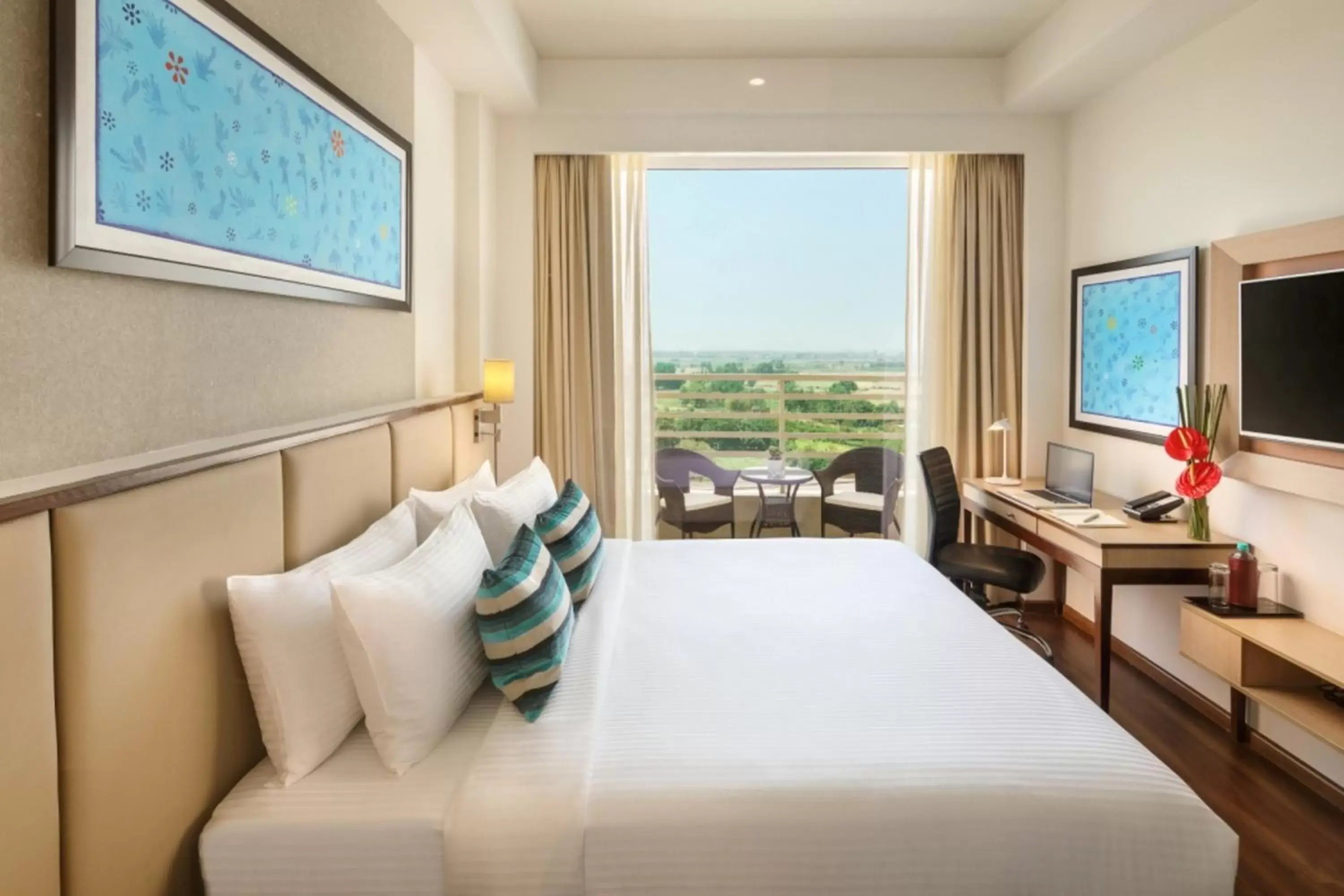 Bedroom in Sandal Suites by Lemon Tree Hotels
