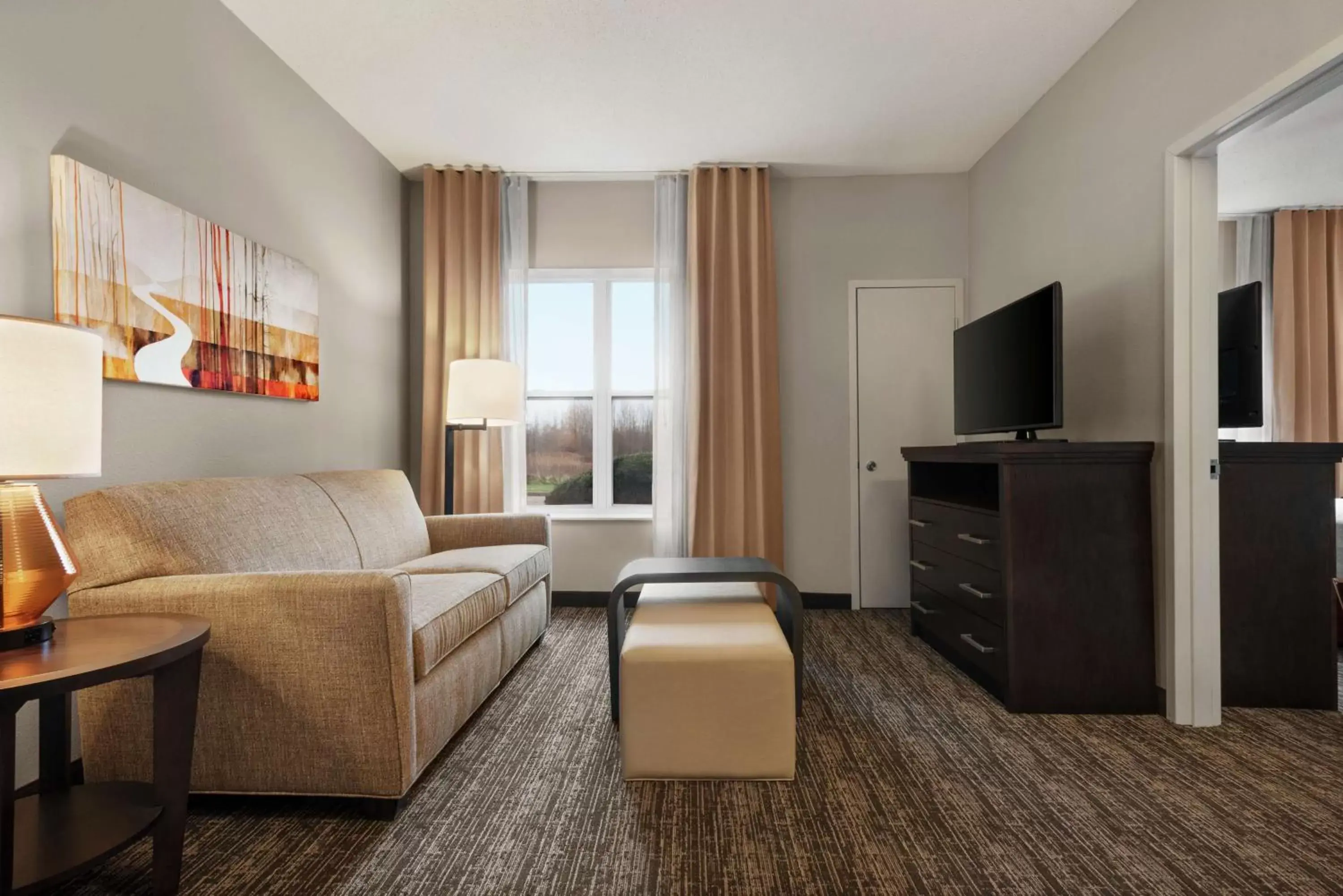 Bedroom, Seating Area in Homewood Suites Rochester-Henrietta