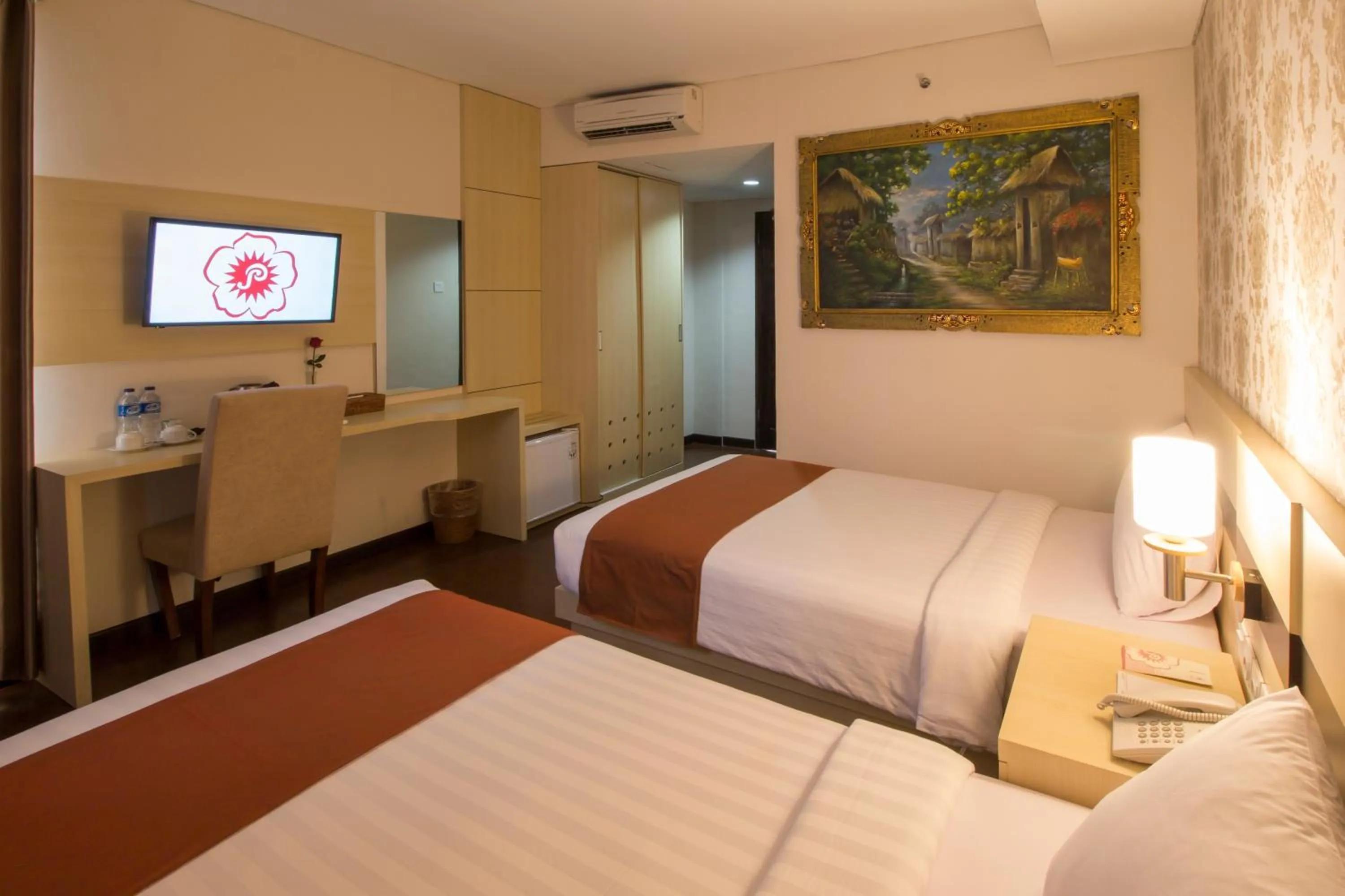 Bed in Grand Puri Saron Hotel Yogyakarta