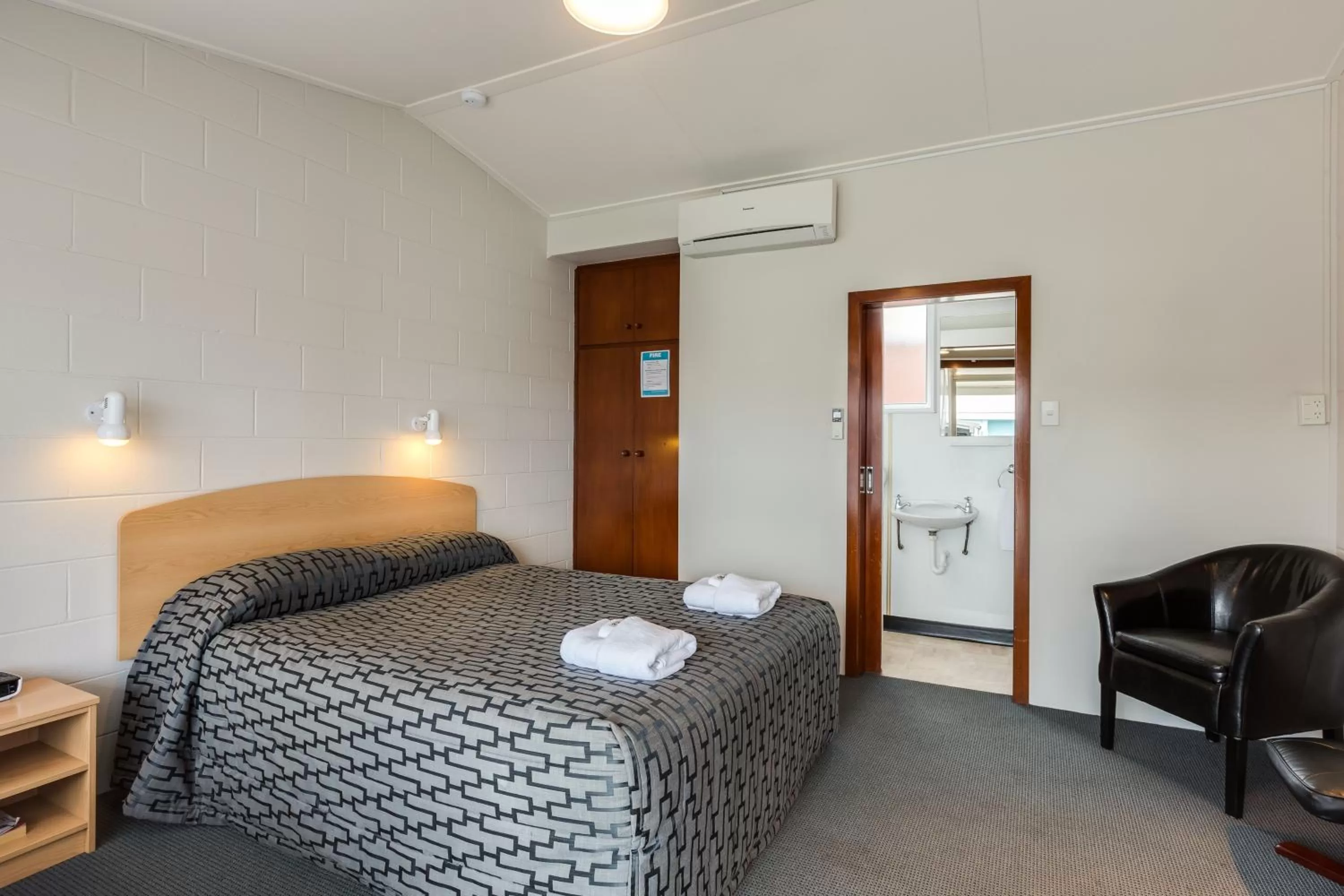 Seating area, Bed in Ocean Beach Hotel