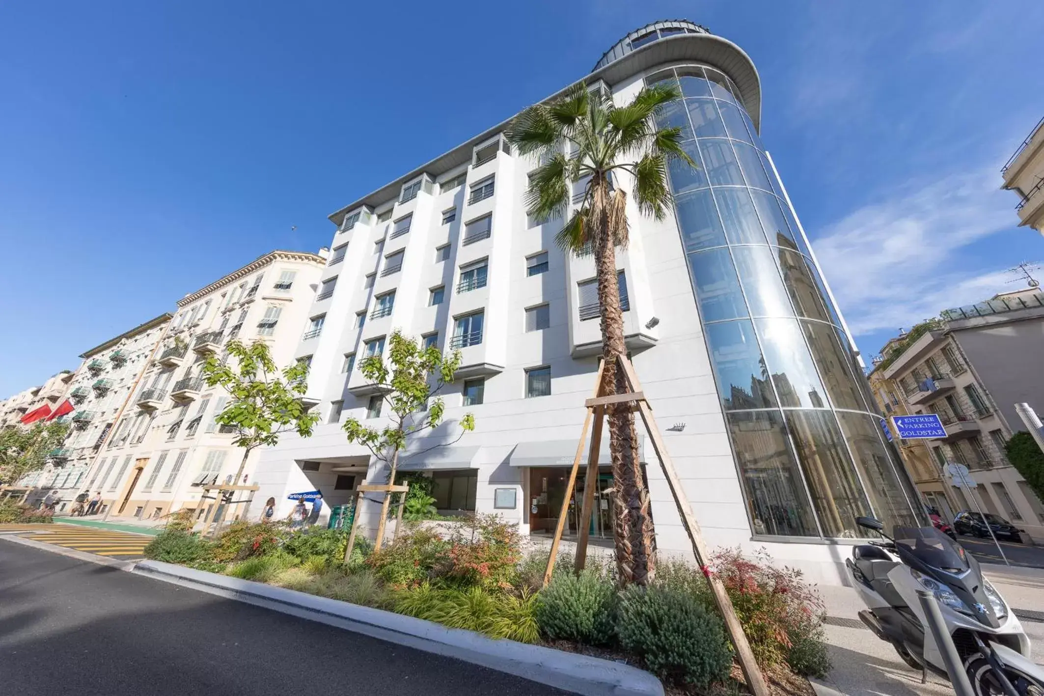 Facade/entrance, Property Building in Goldstar Apartments & Suites