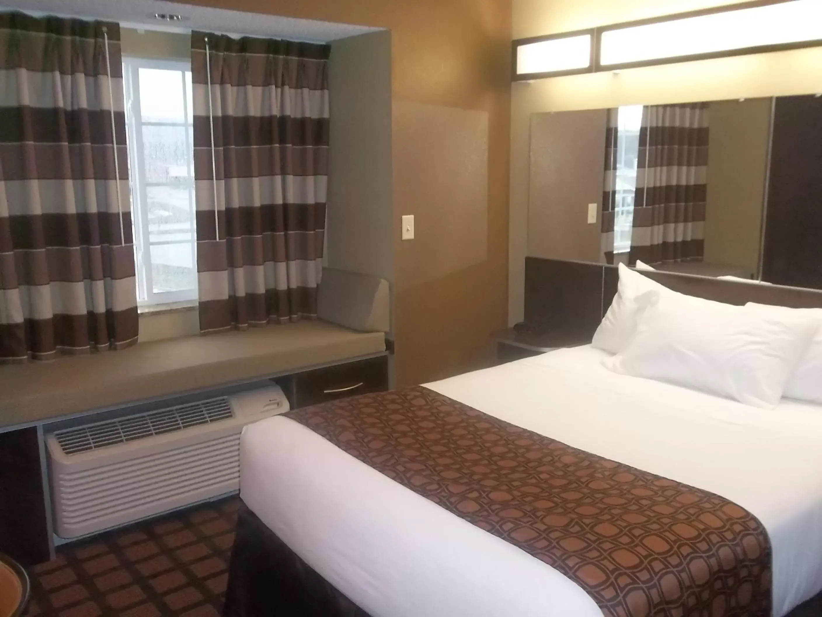 Photo of the whole room, Bed in Microtel Inn & Suites-Sayre, PA