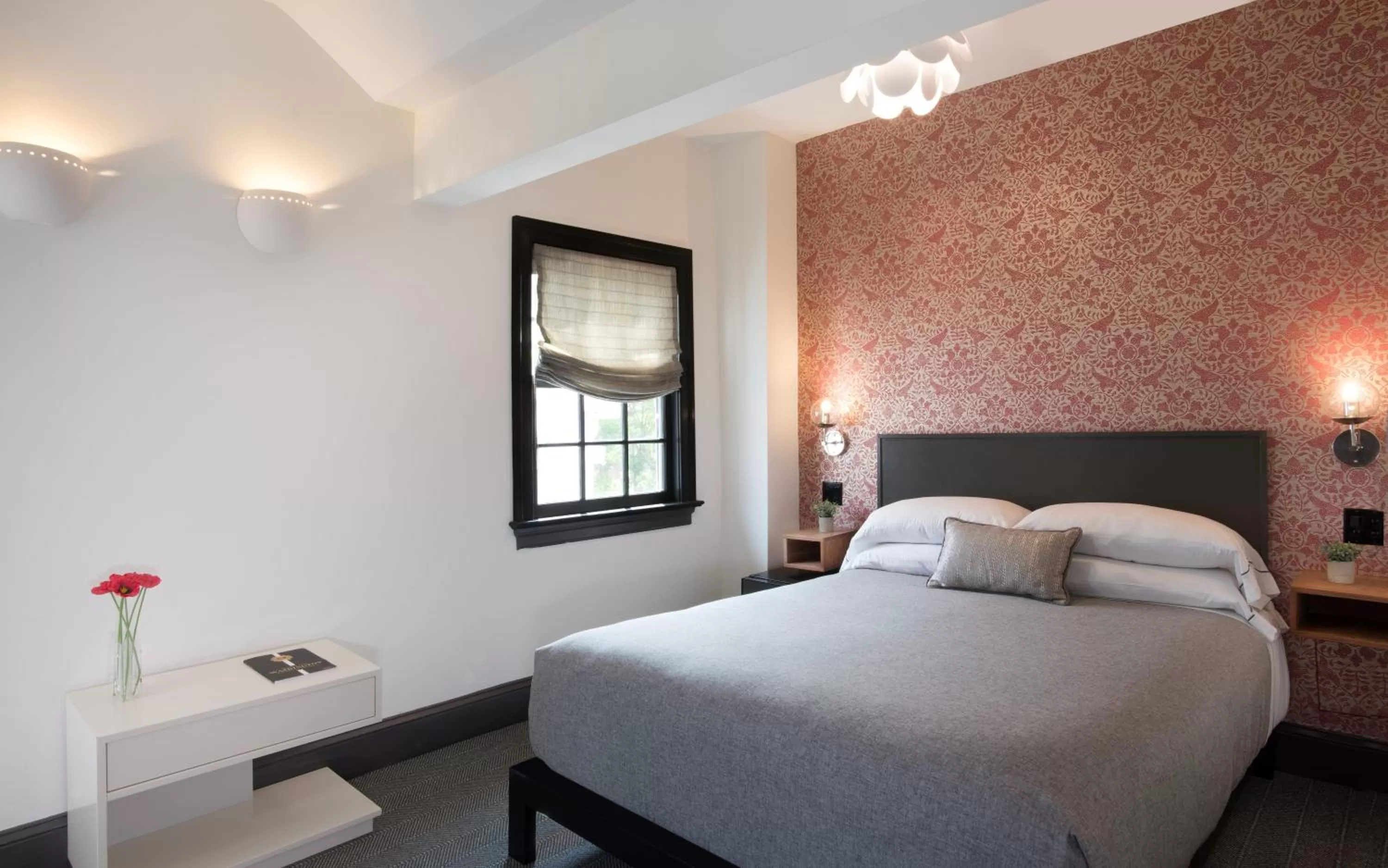 Bed in The Poppy Georgetown Guesthouse and Gardens