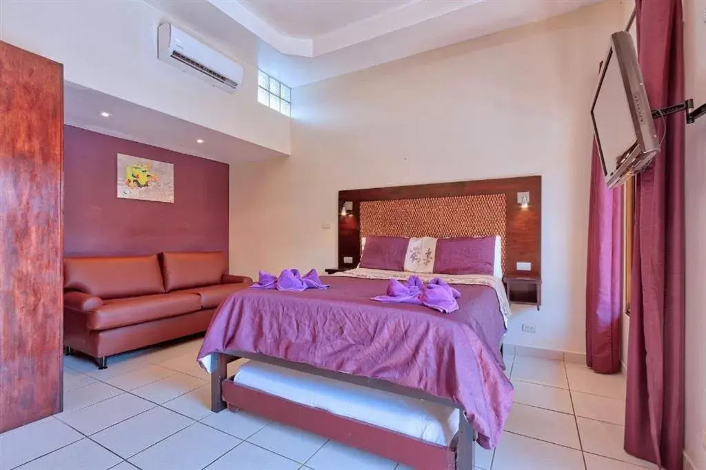 Bed in Las Brisas Resort and Villas