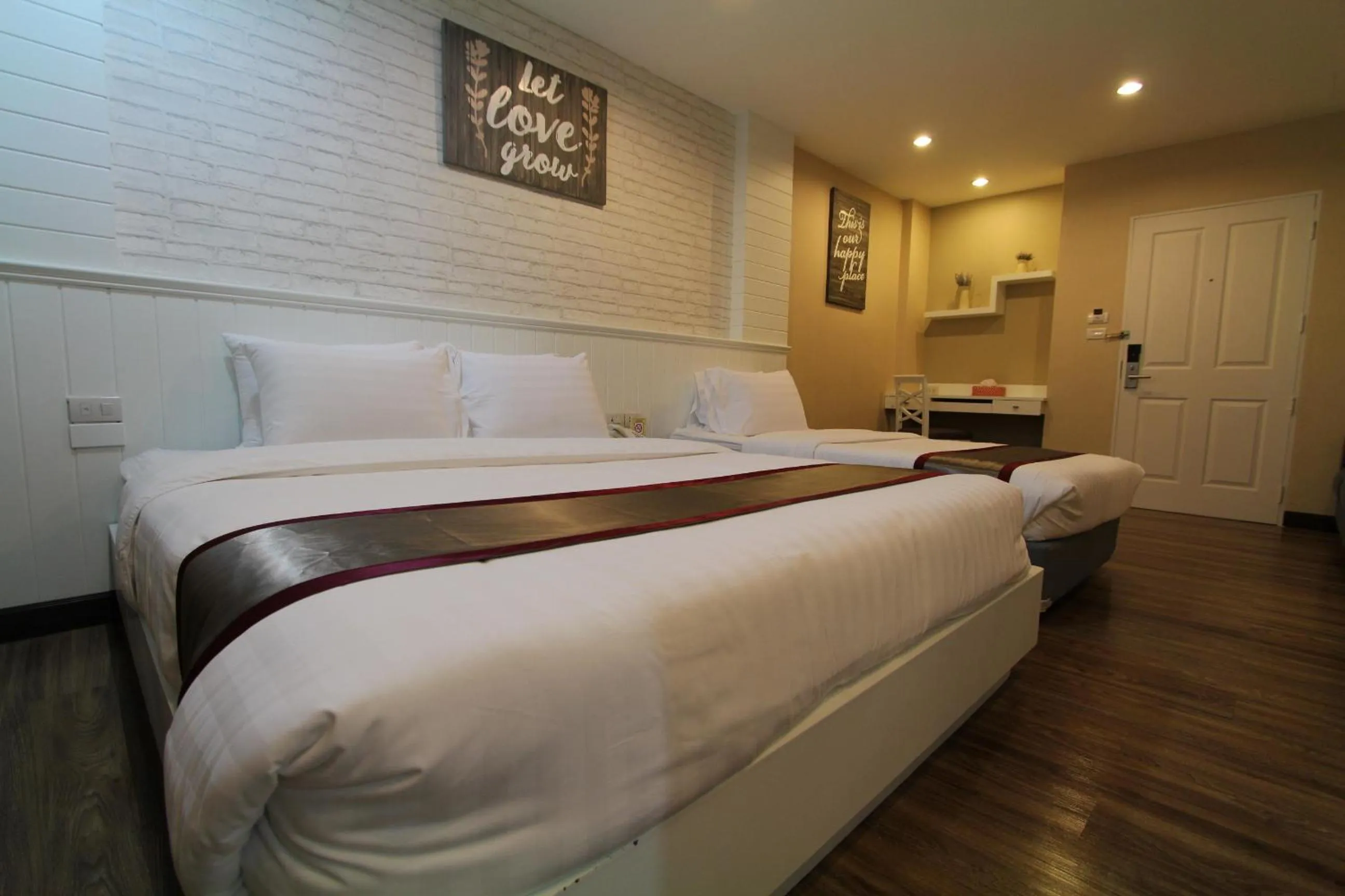 Bed in At Residence Suvarnabhumi Hotel