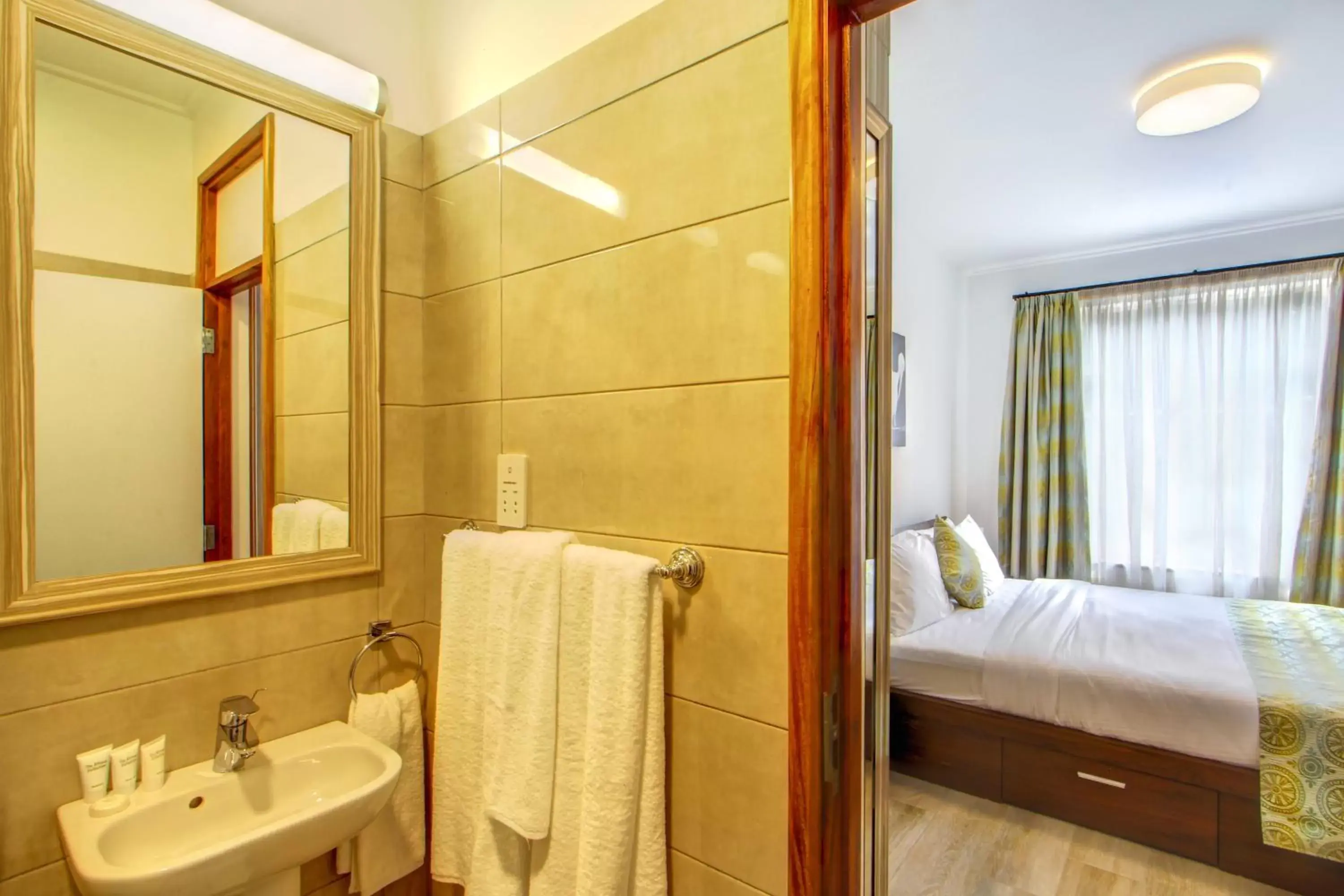 Bed, Bathroom in Executive Residency by Best Western Nairobi