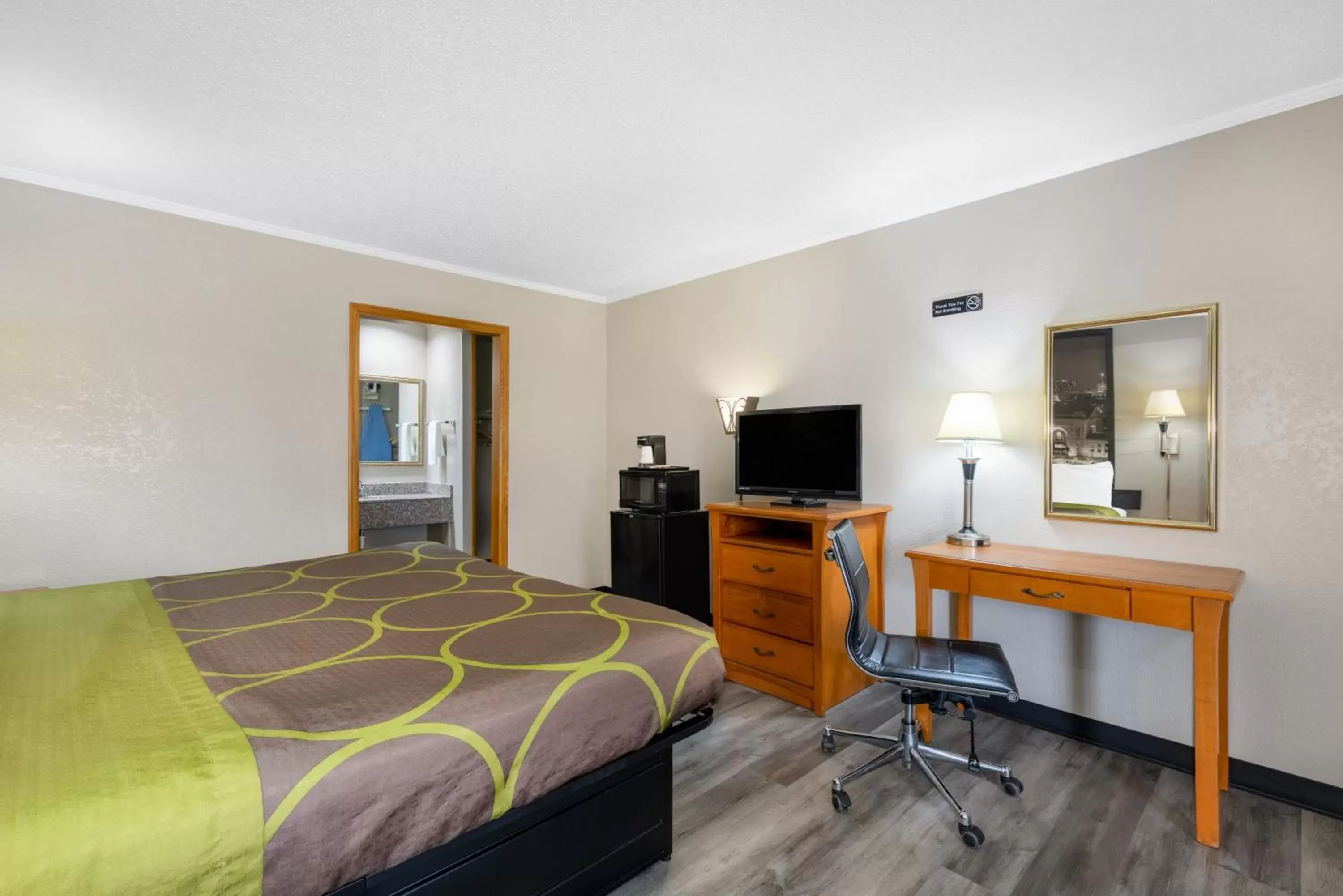 TV/Entertainment Center in Super 8 by Wyndham Kansas City Airport North