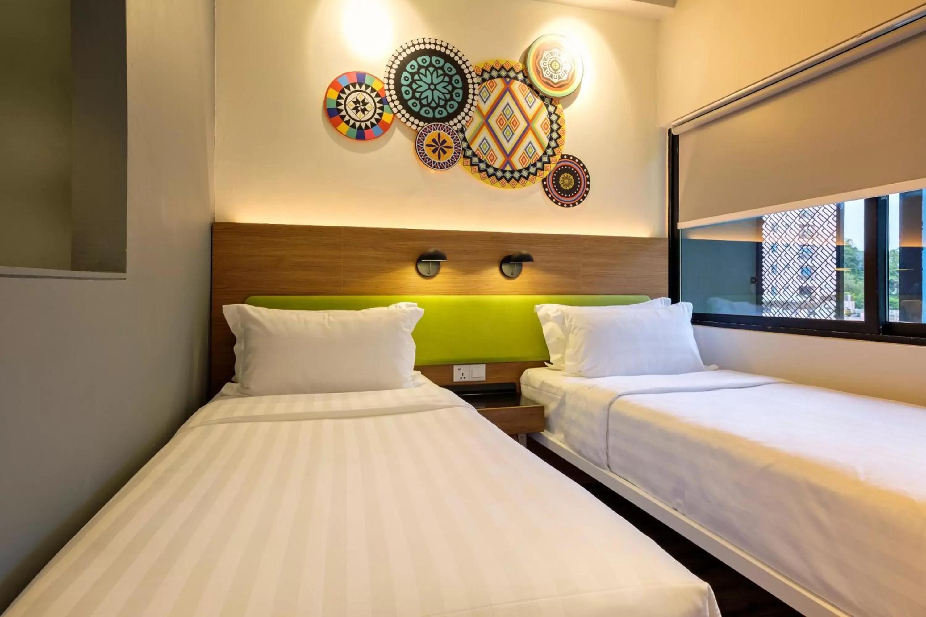 Bed in TOOJOU Kota Kinabalu