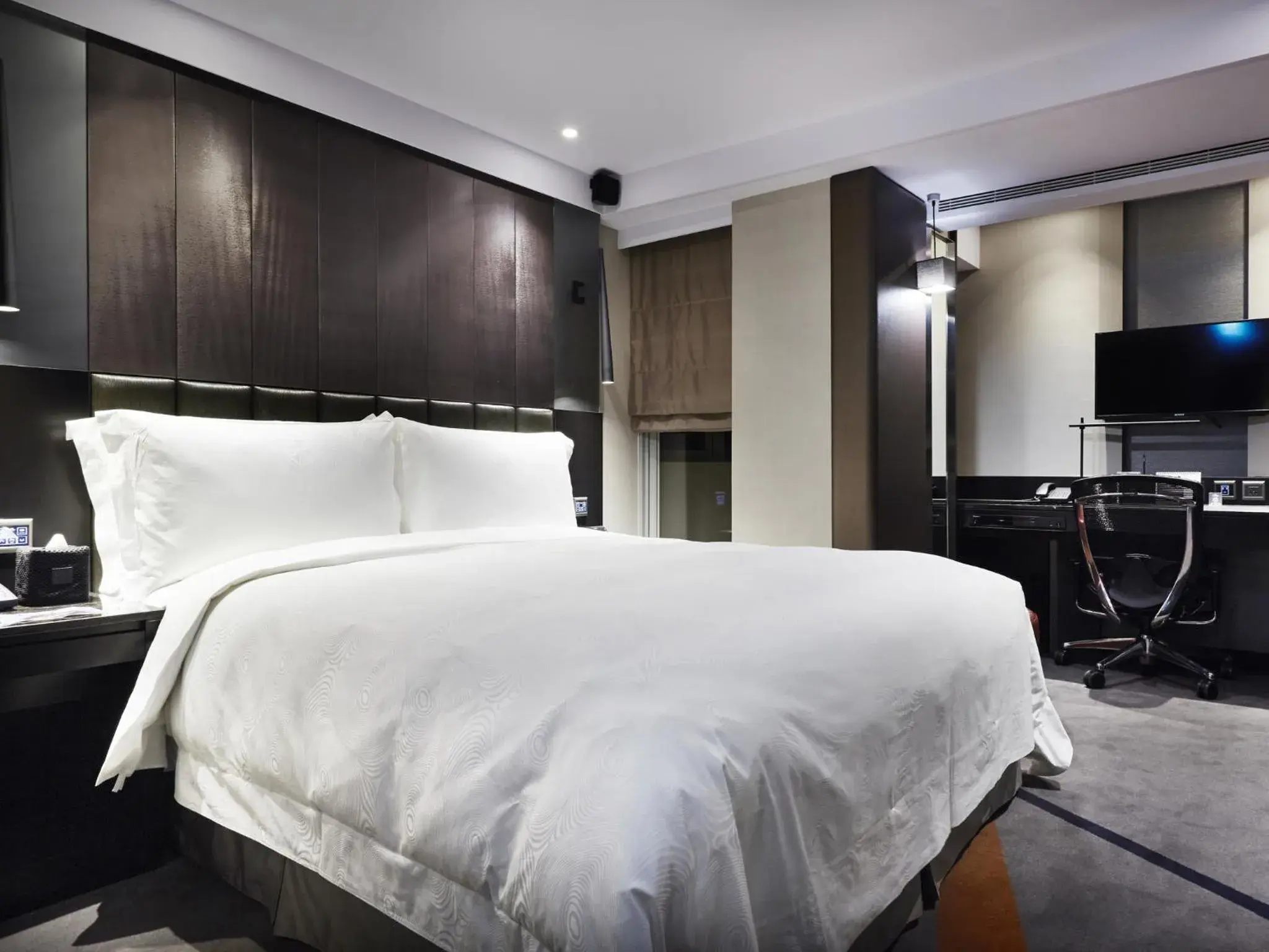 Bed in Tango Hotel Taipei Fuhsing