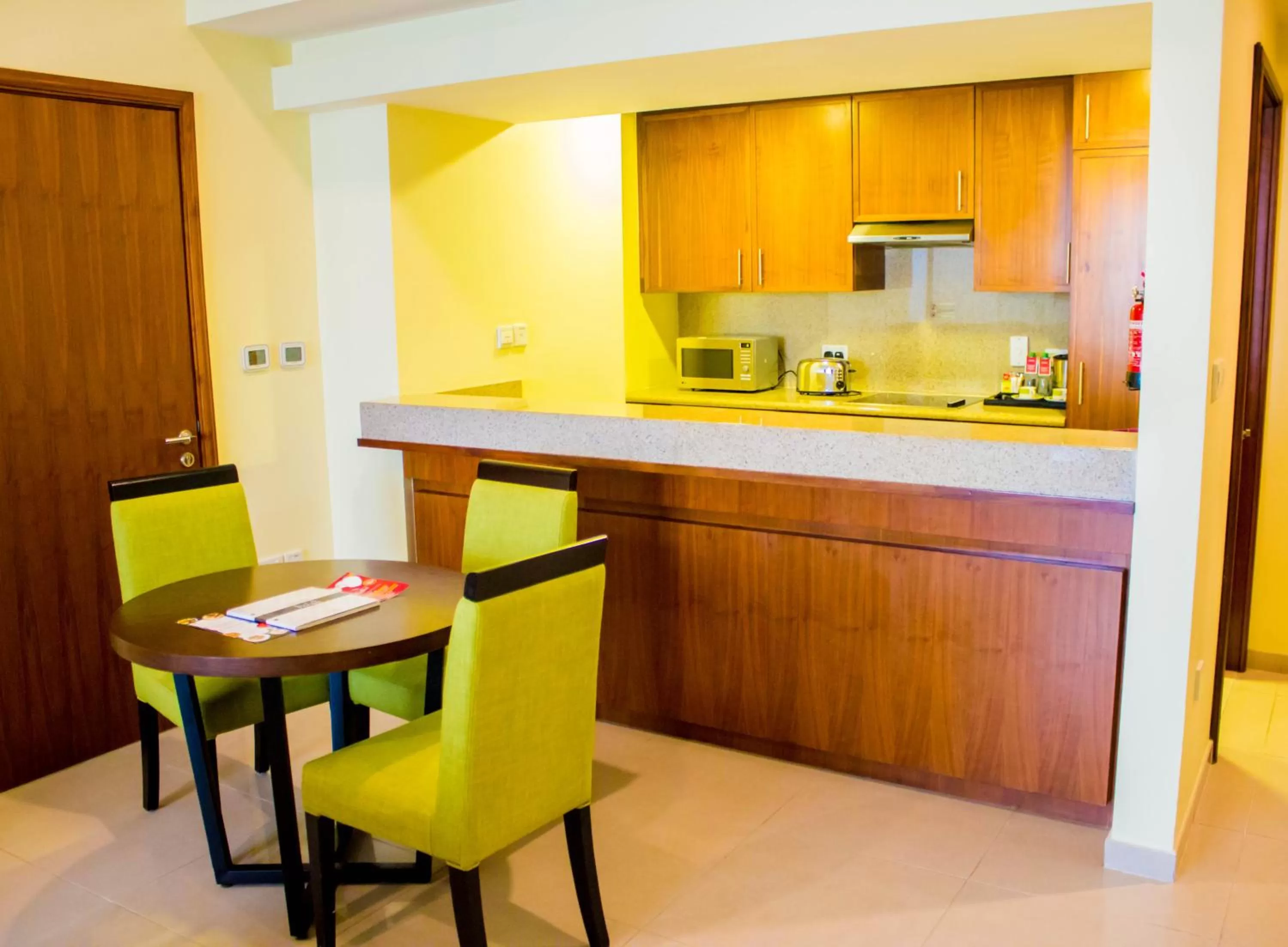 Kitchen or kitchenette in Ramada by Wyndham Downtown Dubai