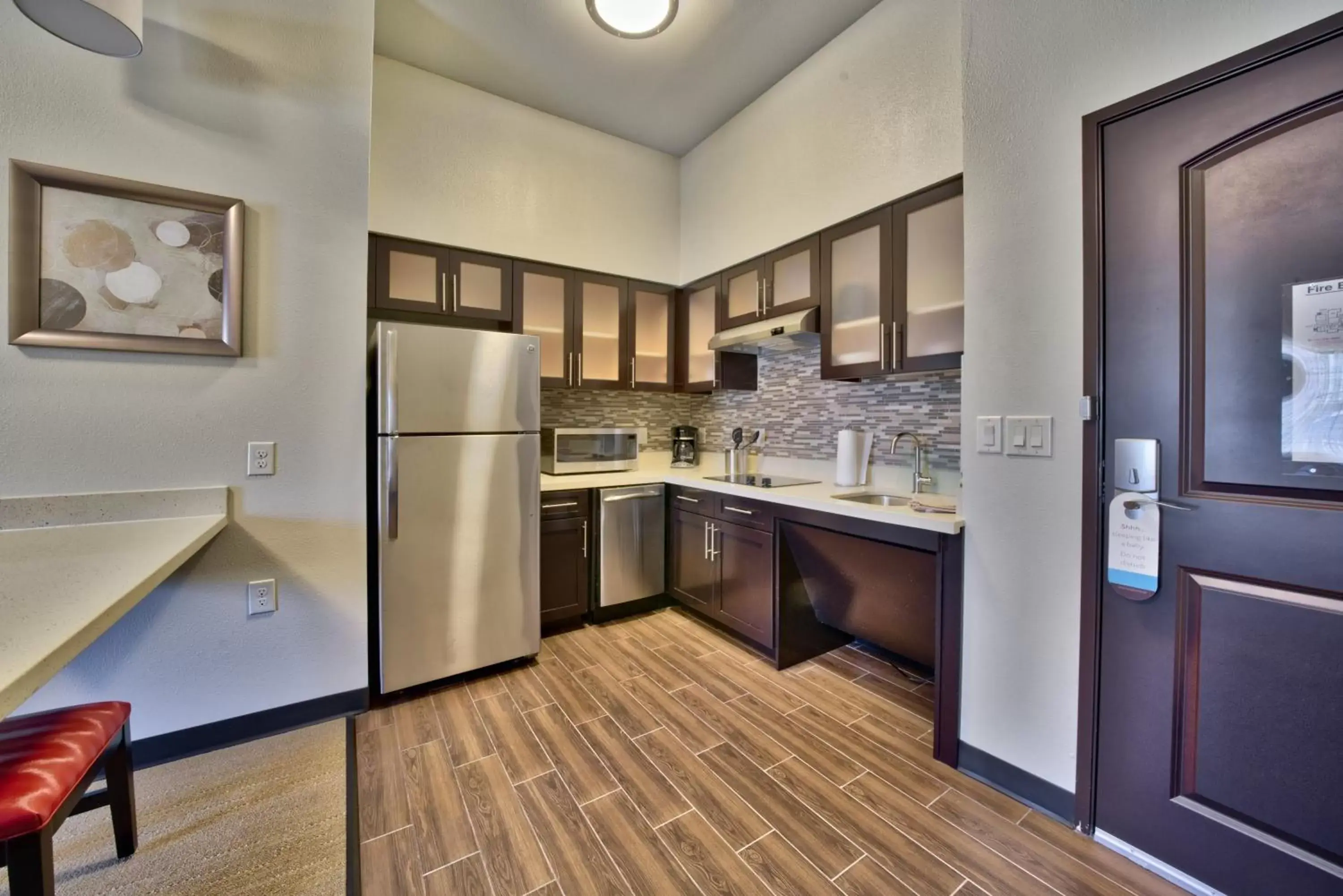 Photo of the whole room, Kitchen/Kitchenette in Staybridge Suites Lubbock South, an IHG Hotel