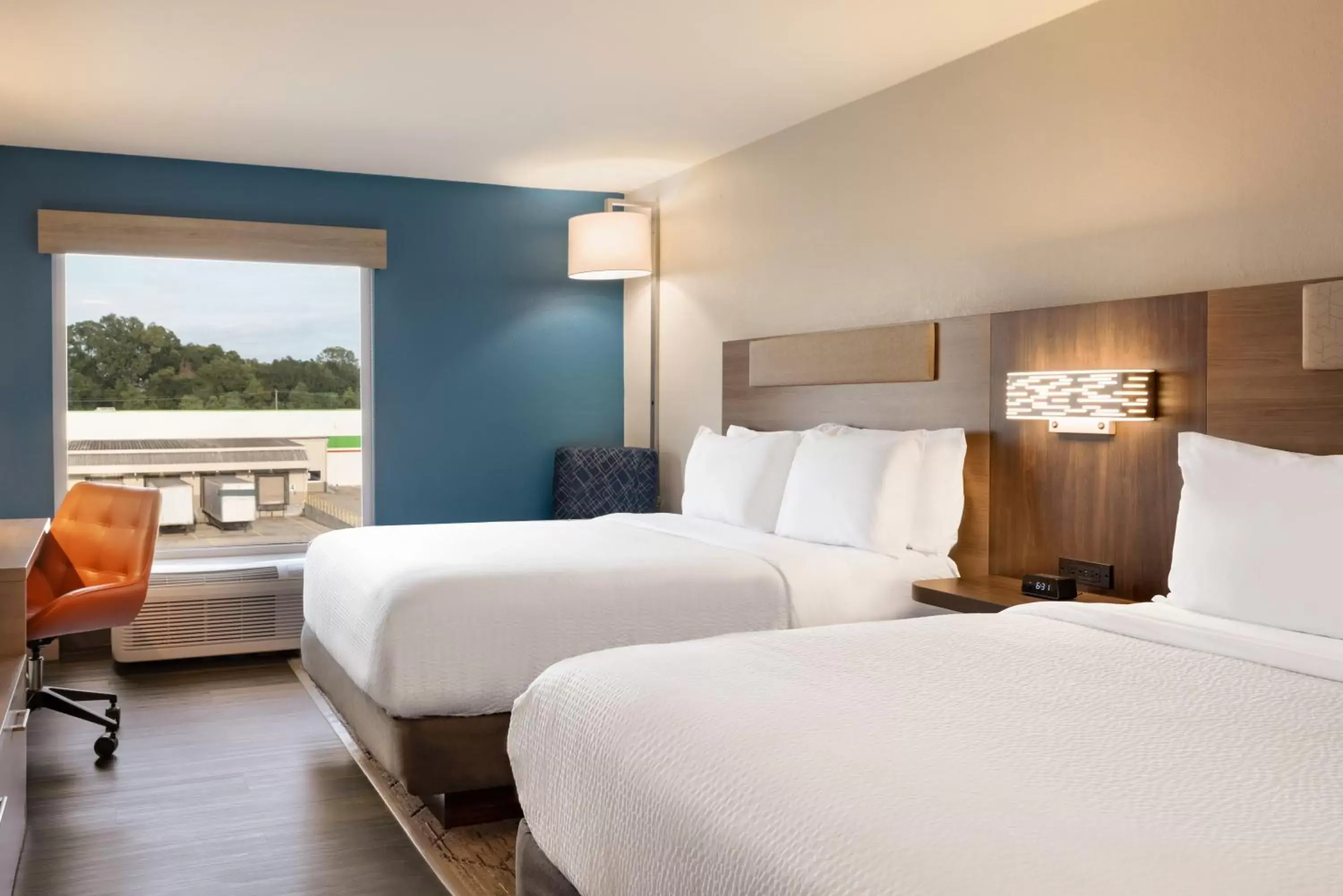 Bedroom, Bed in Holiday Inn Express & Suites Opelousas, an IHG Hotel