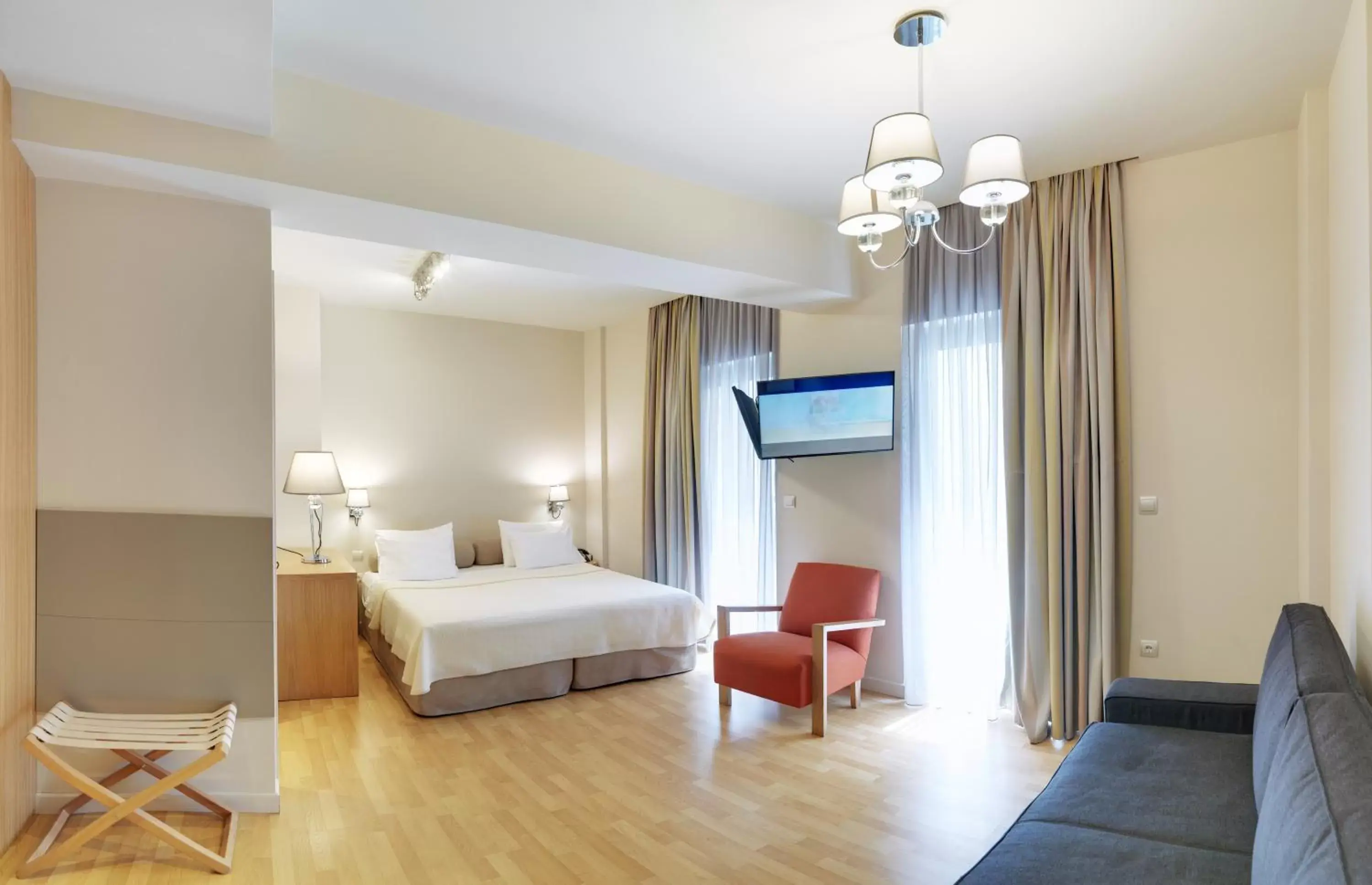 Bed in Phidias Piraeus Hotel