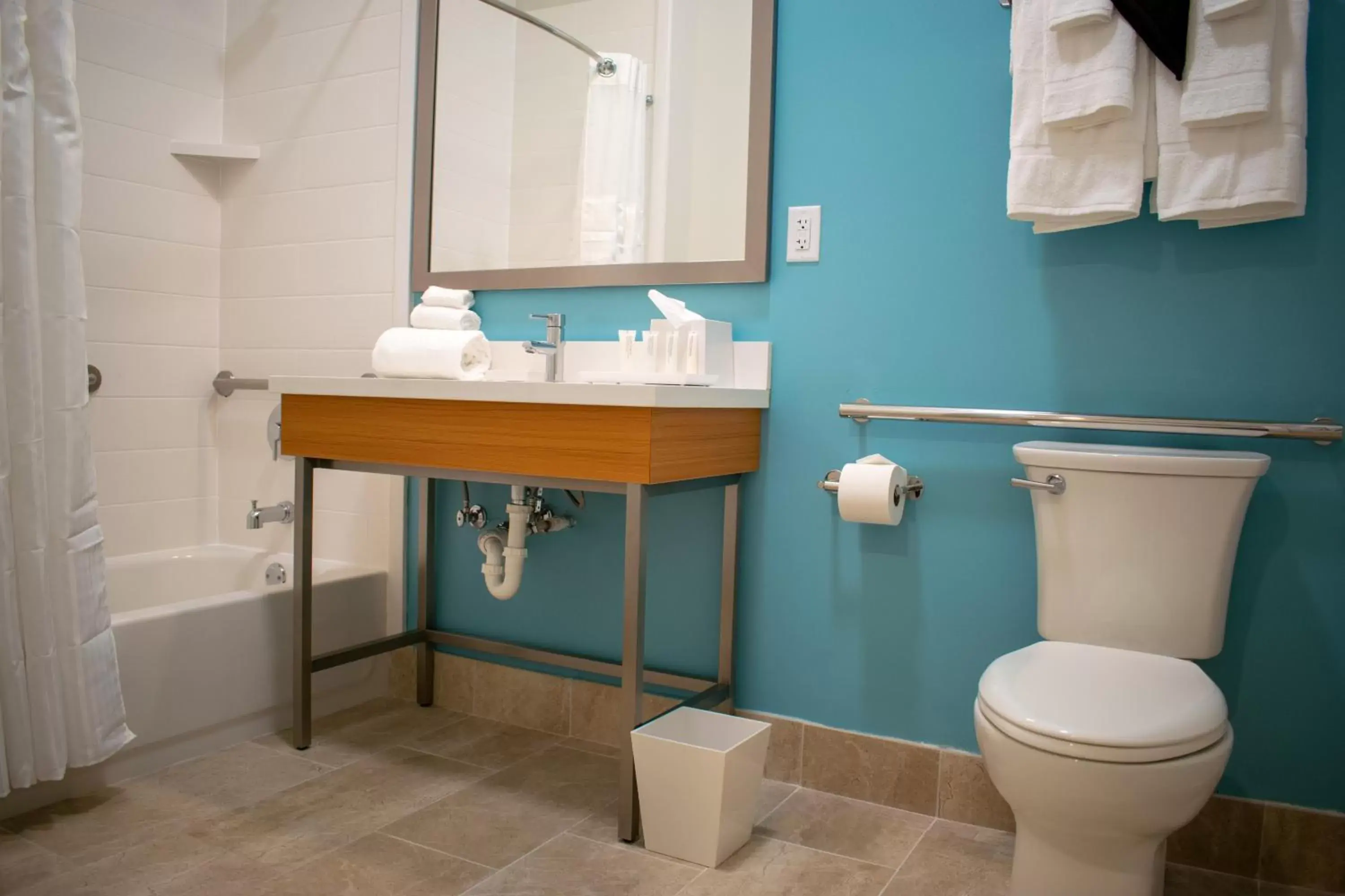 Toilet, Bathroom in Oasis Resort Gulfport
