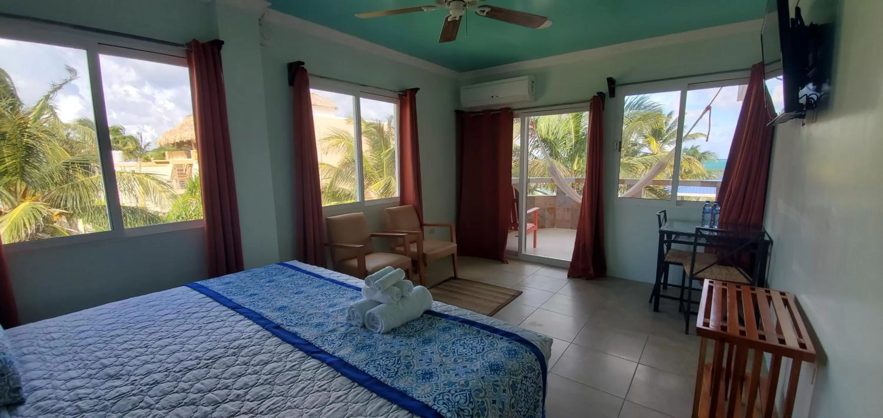 Photo of the whole room, Bed in Island Magic Beach Resort