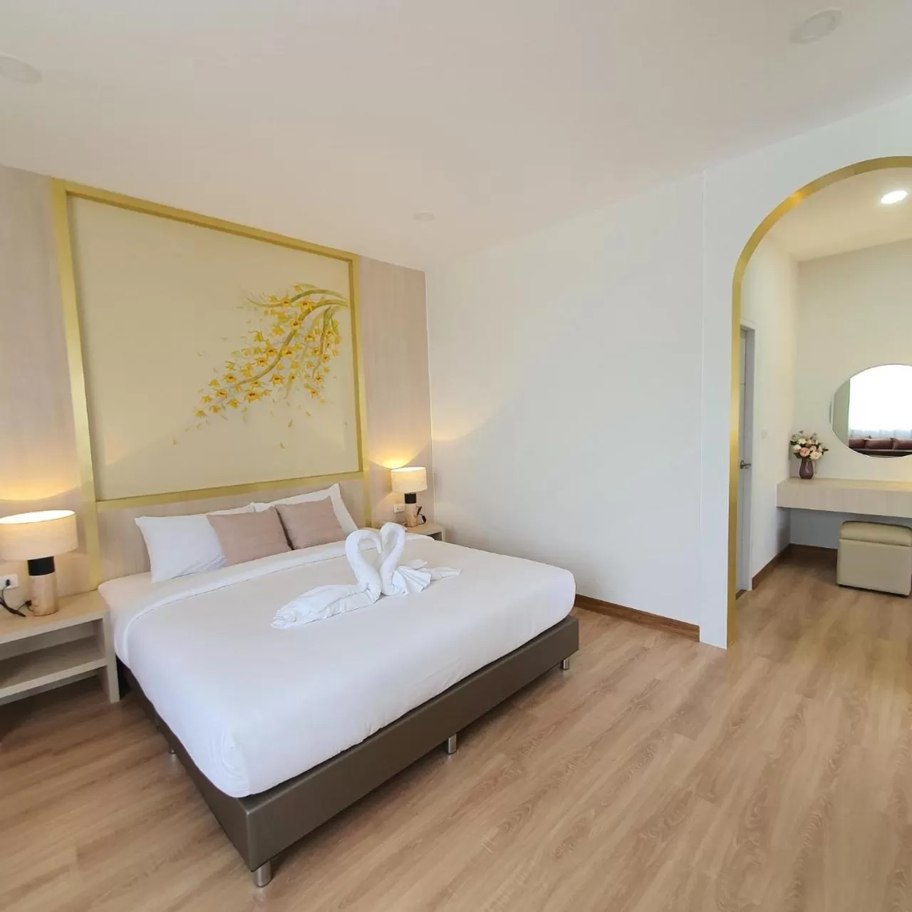 Bed in Lueangchan Orchid Hotel