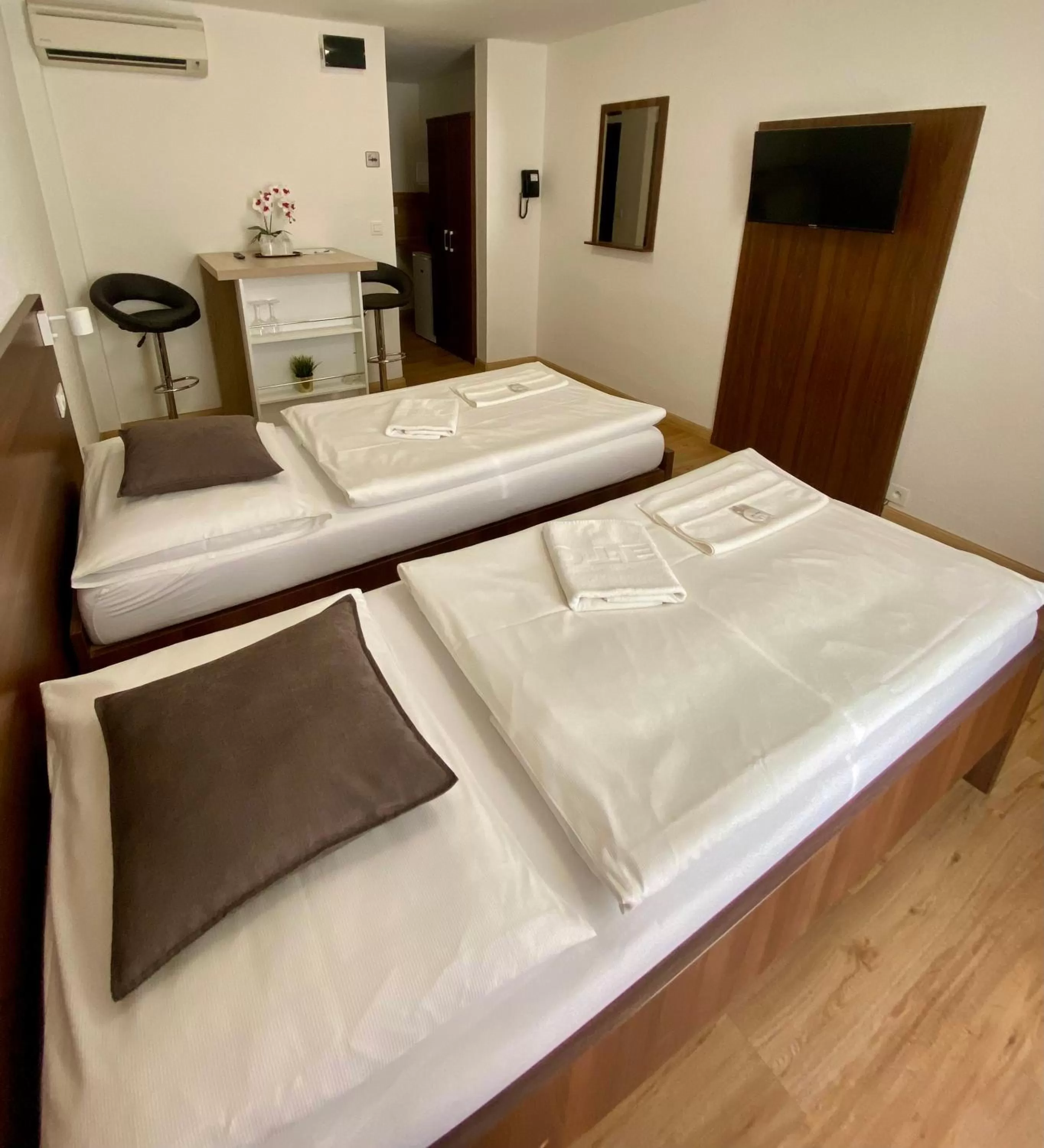 Photo of the whole room, Bed in WX Hotel