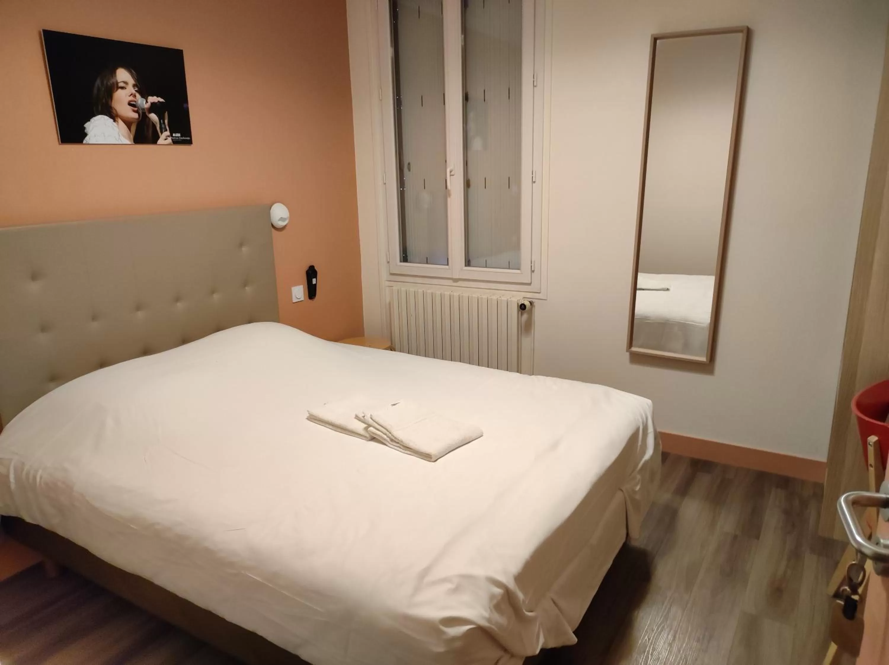 Bed in Hotel le Faisan