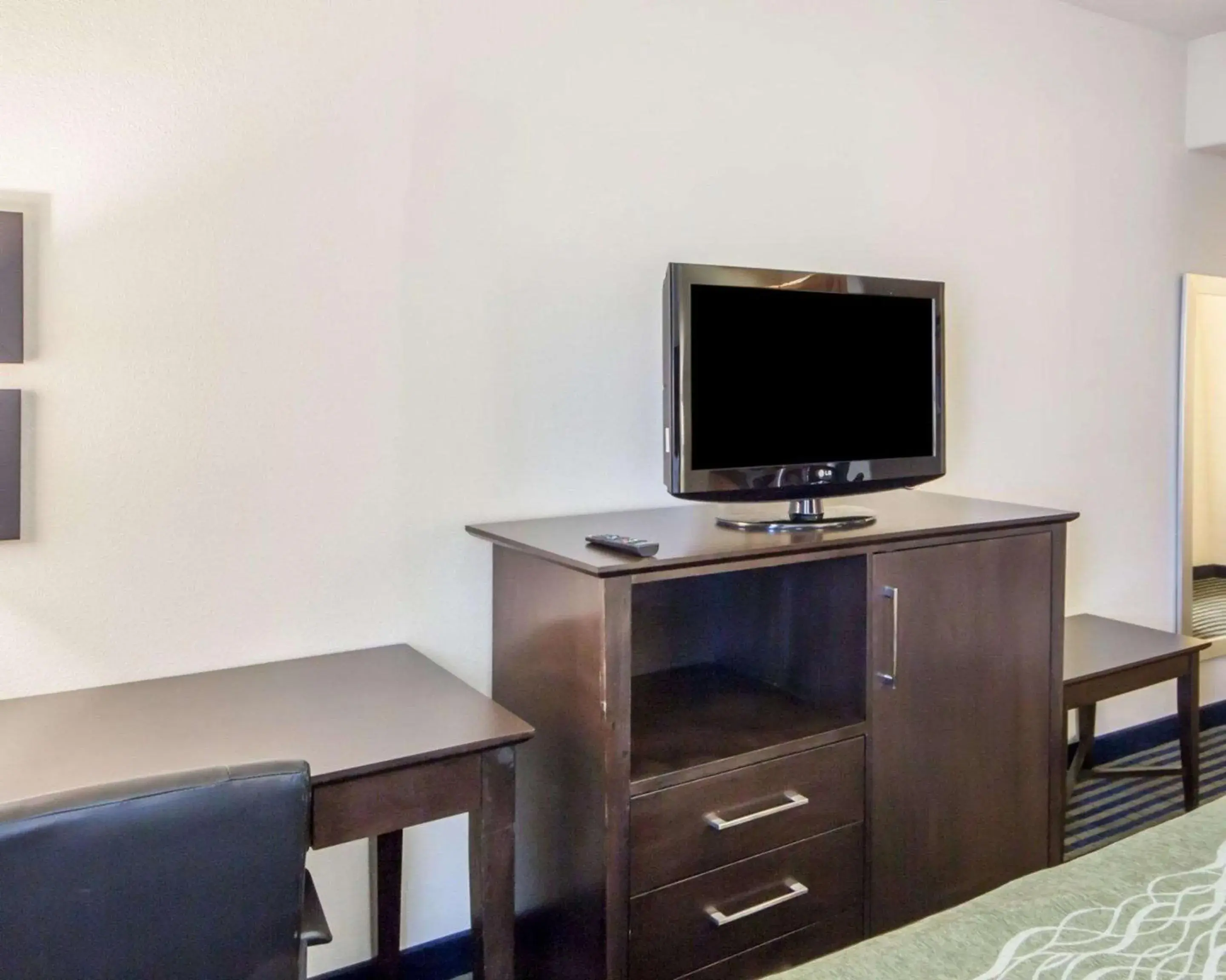 Photo of the whole room, TV/Entertainment Center in Quality Inn Tulsa-Downtown West