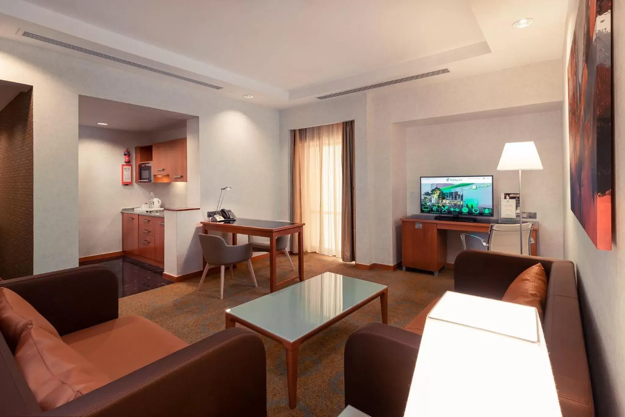 Bedroom, Seating Area in Holiday Inn Kuwait, an IHG Hotel