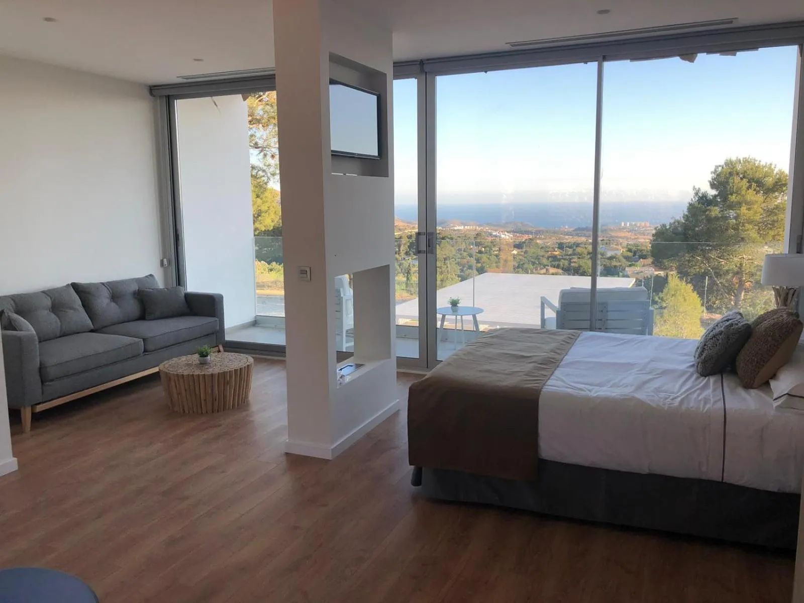 Photo of the whole room, Bed in Nature Suites Puig Campana by AR Hotels & Resorts