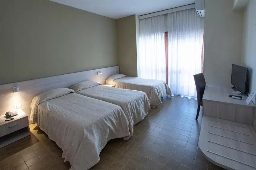 Bed in Hotel Scacciapensieri