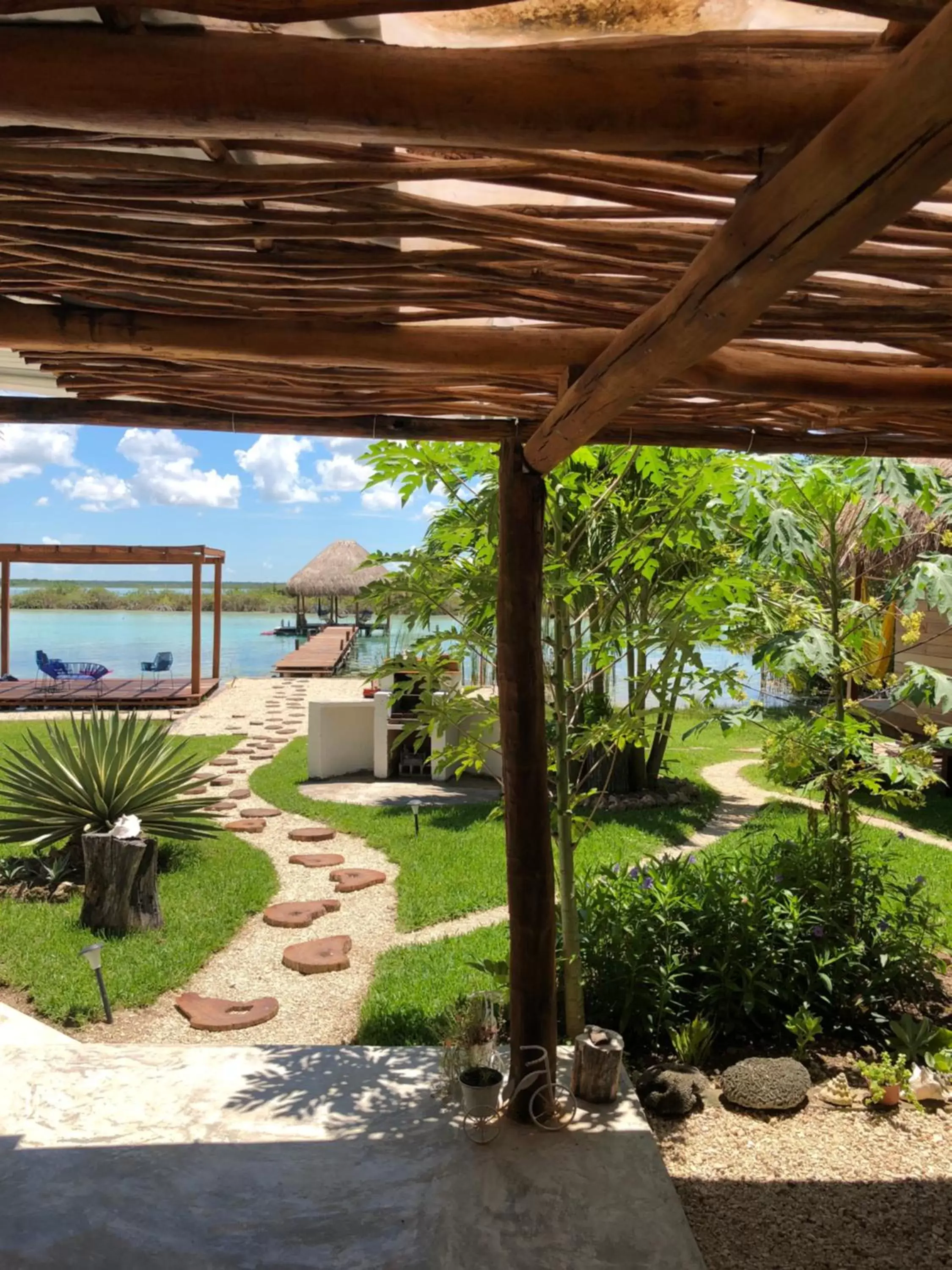 Garden view in Casa Shiva Bacalar by MIJ