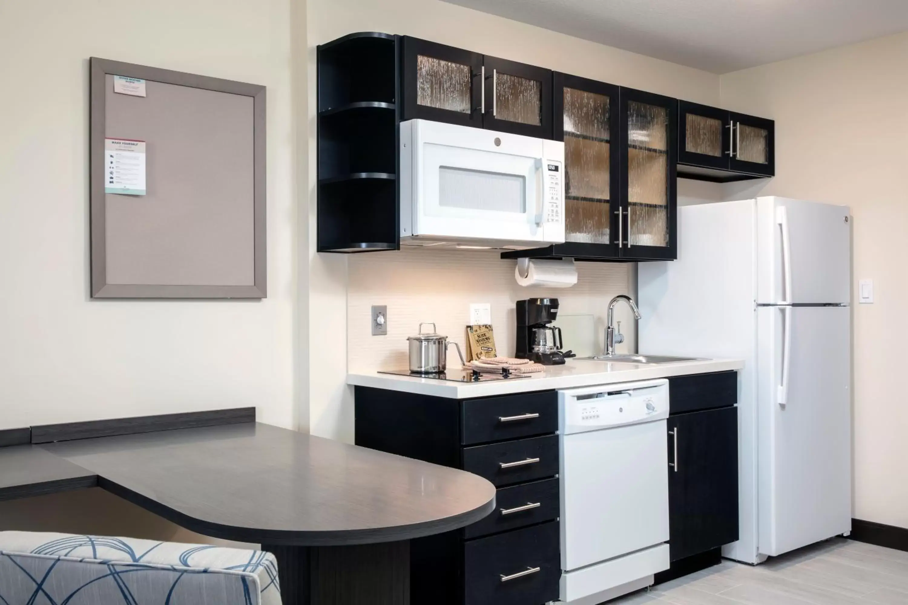 Photo of the whole room, Kitchen/Kitchenette in Candlewood Suites - Miami Exec Airport - Kendall, an IHG Hotel