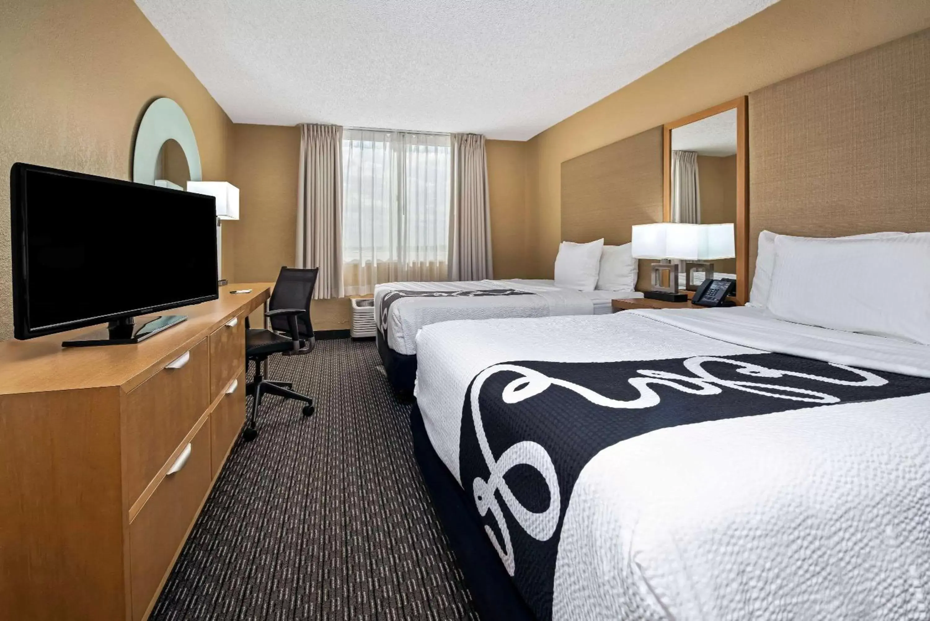 Photo of the whole room, Bed in La Quinta by Wyndham West Palm Beach Airport