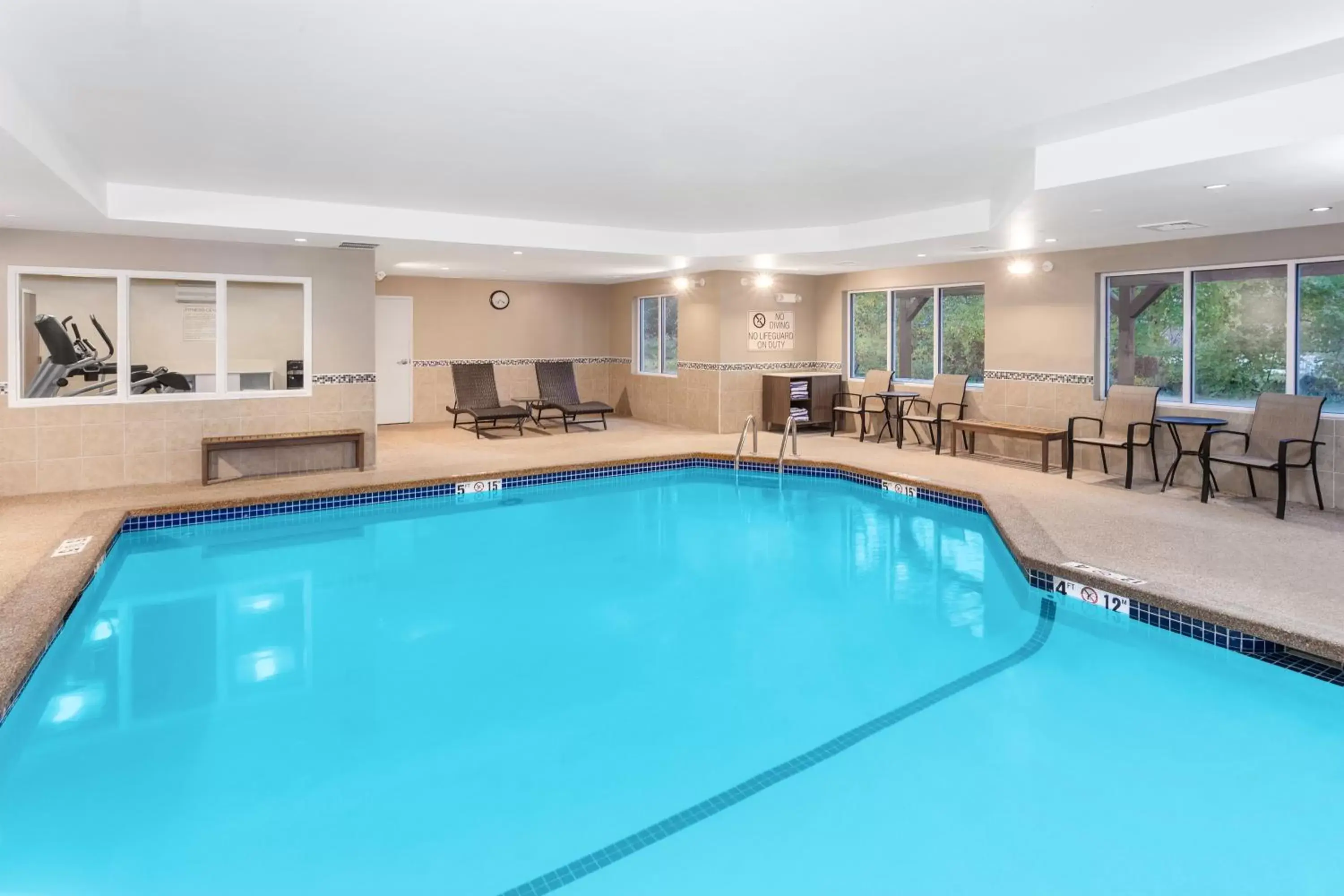 , Swimming Pool in Holiday Inn Express Hotel & Suites Hampton South-Seabrook, an IHG Hotel