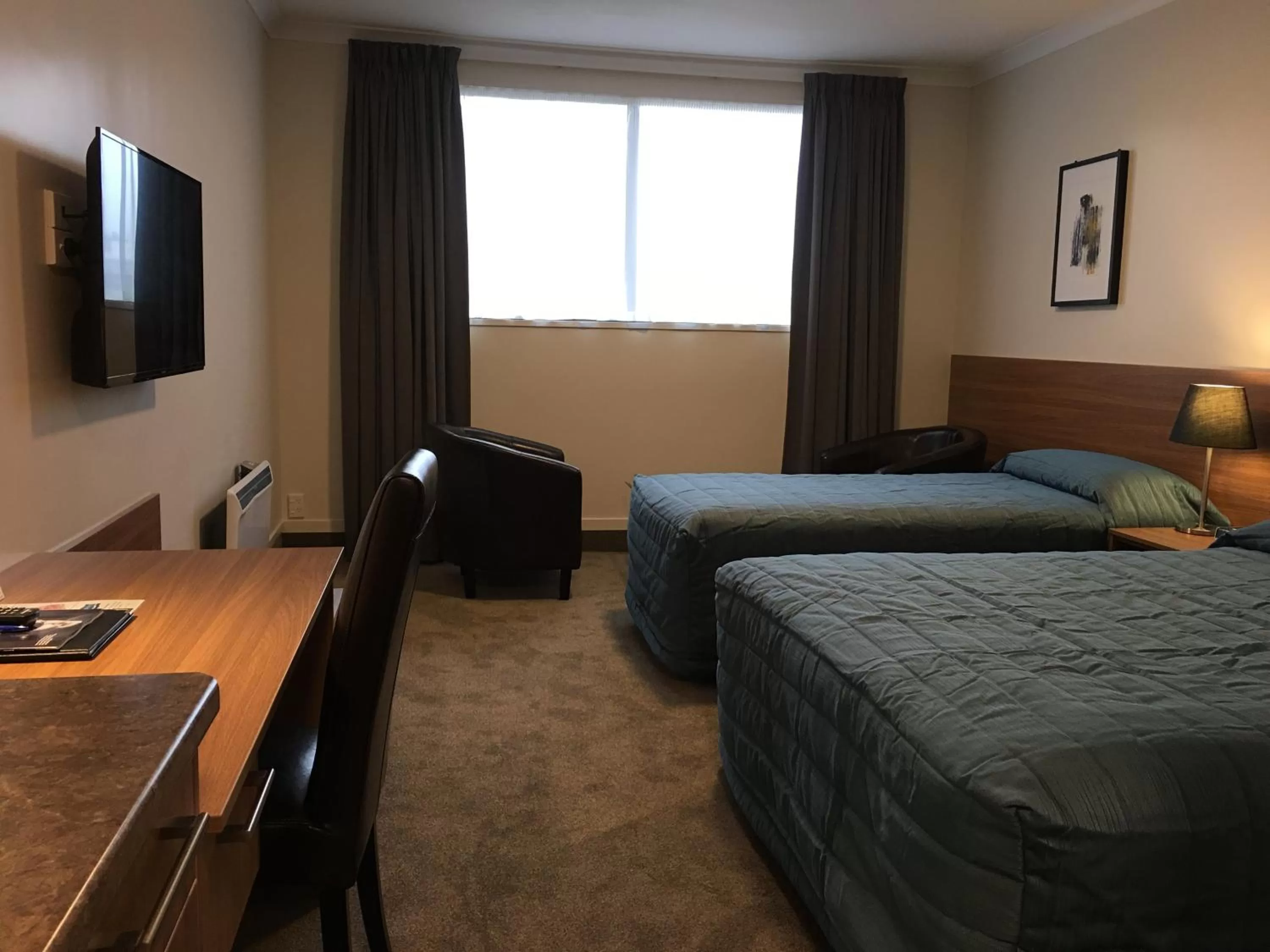 Bed in The Victoria Hotel Dunedin