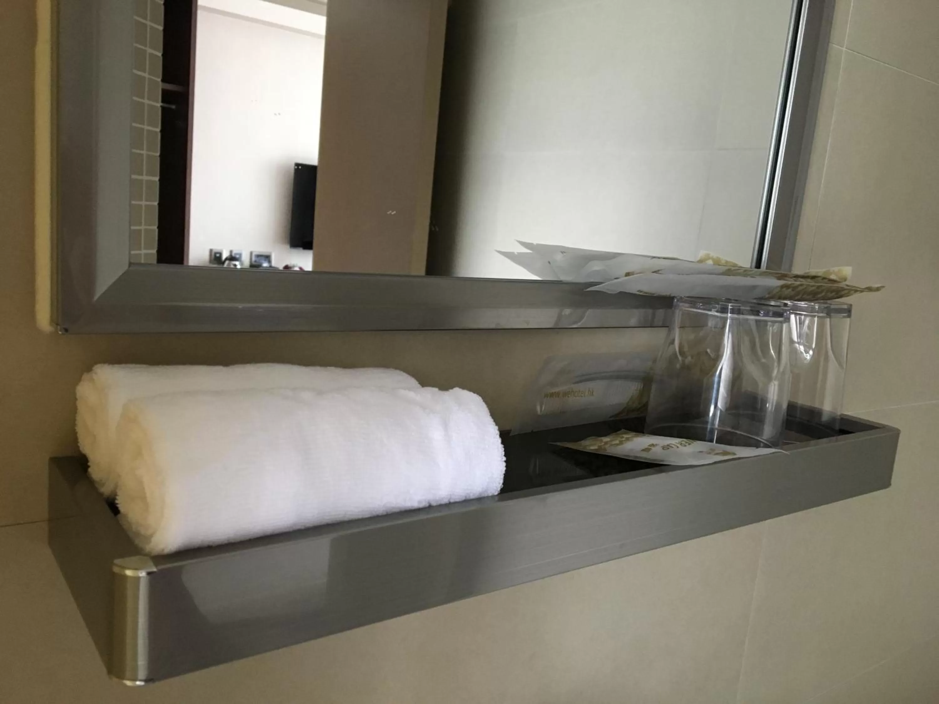 Bathroom, Bed in WE Hotel