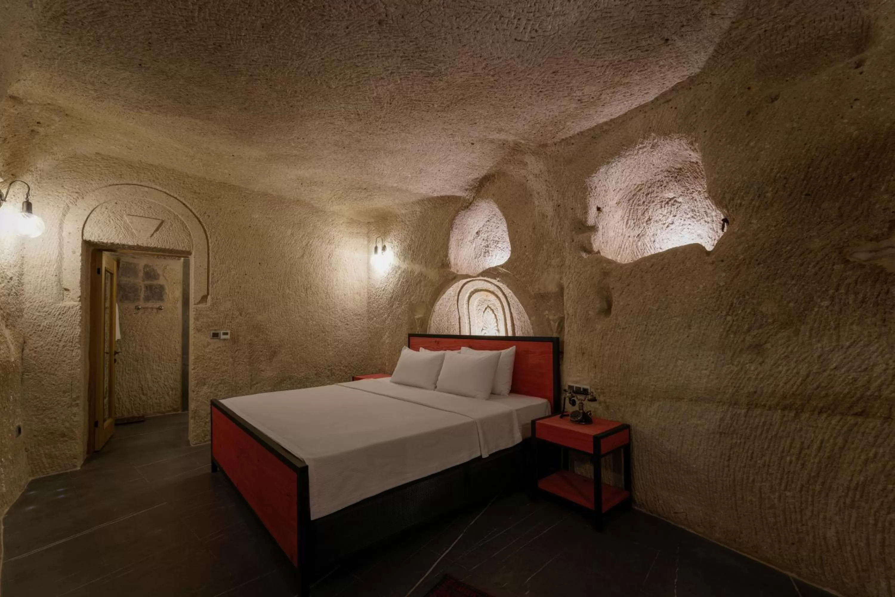 Bed in The Niche Cave Hotel