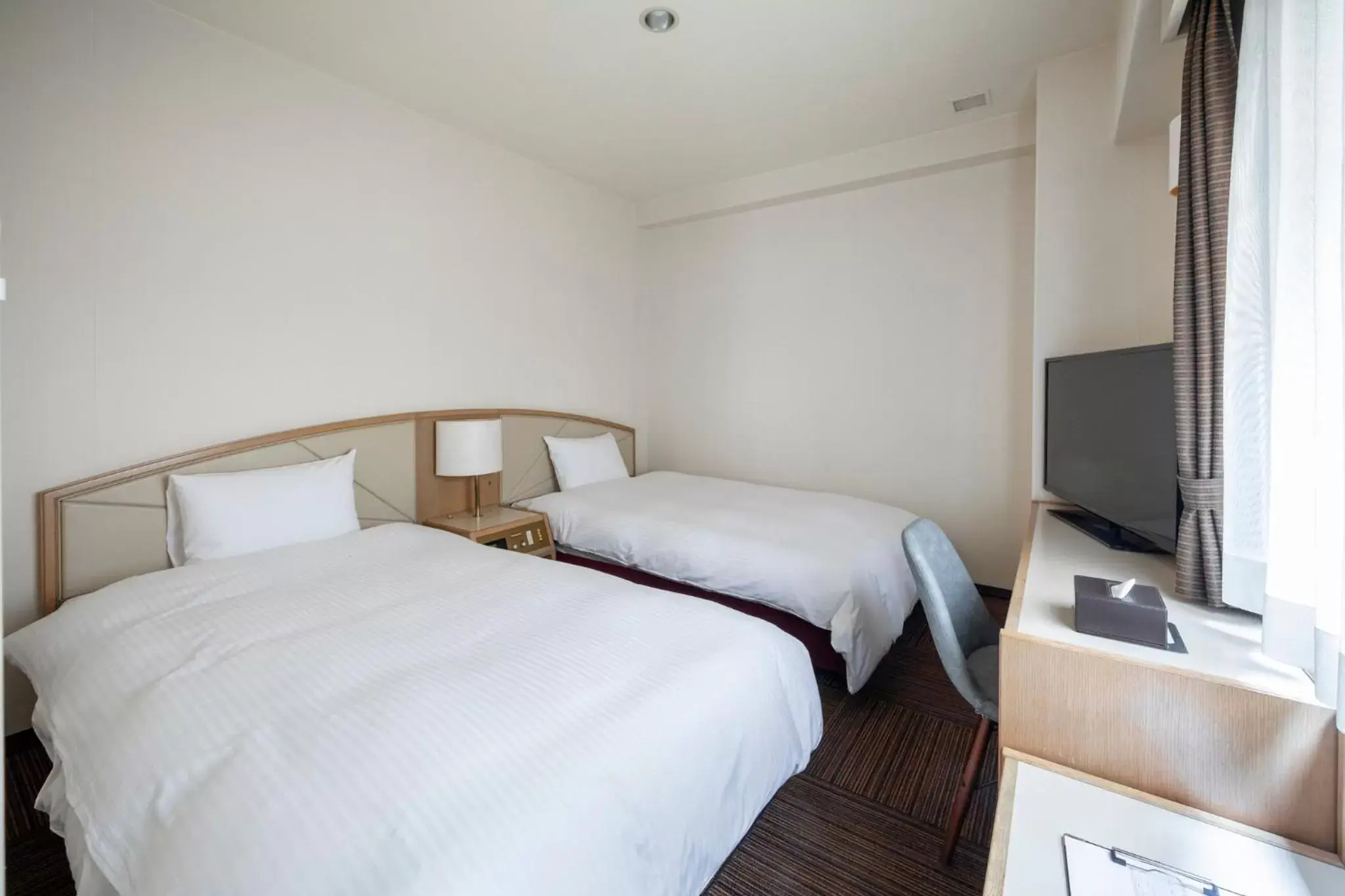 Bed in Court Hotel Niigata