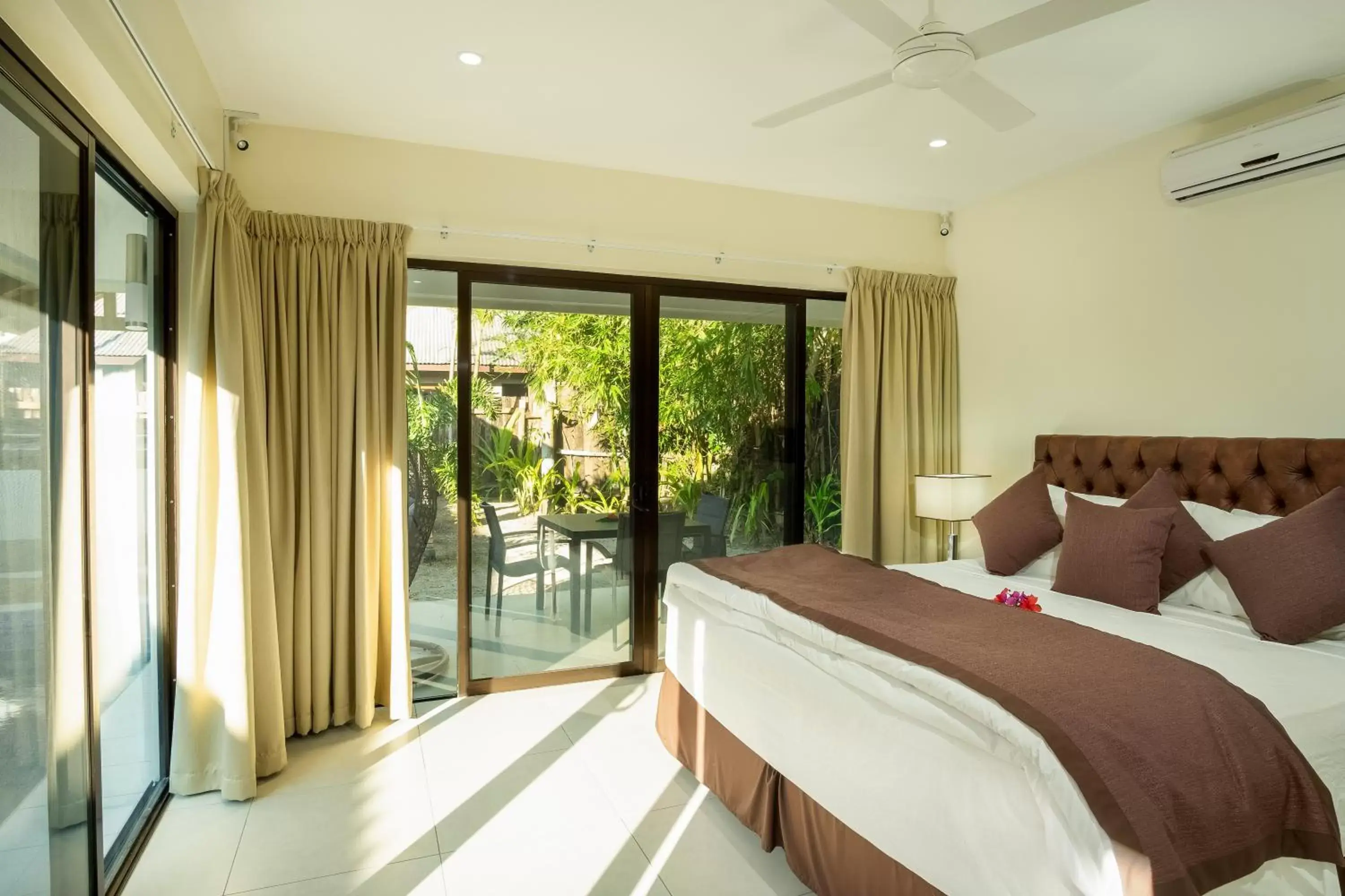 Photo of the whole room, Bed in First Landing Beach Resort & Villas