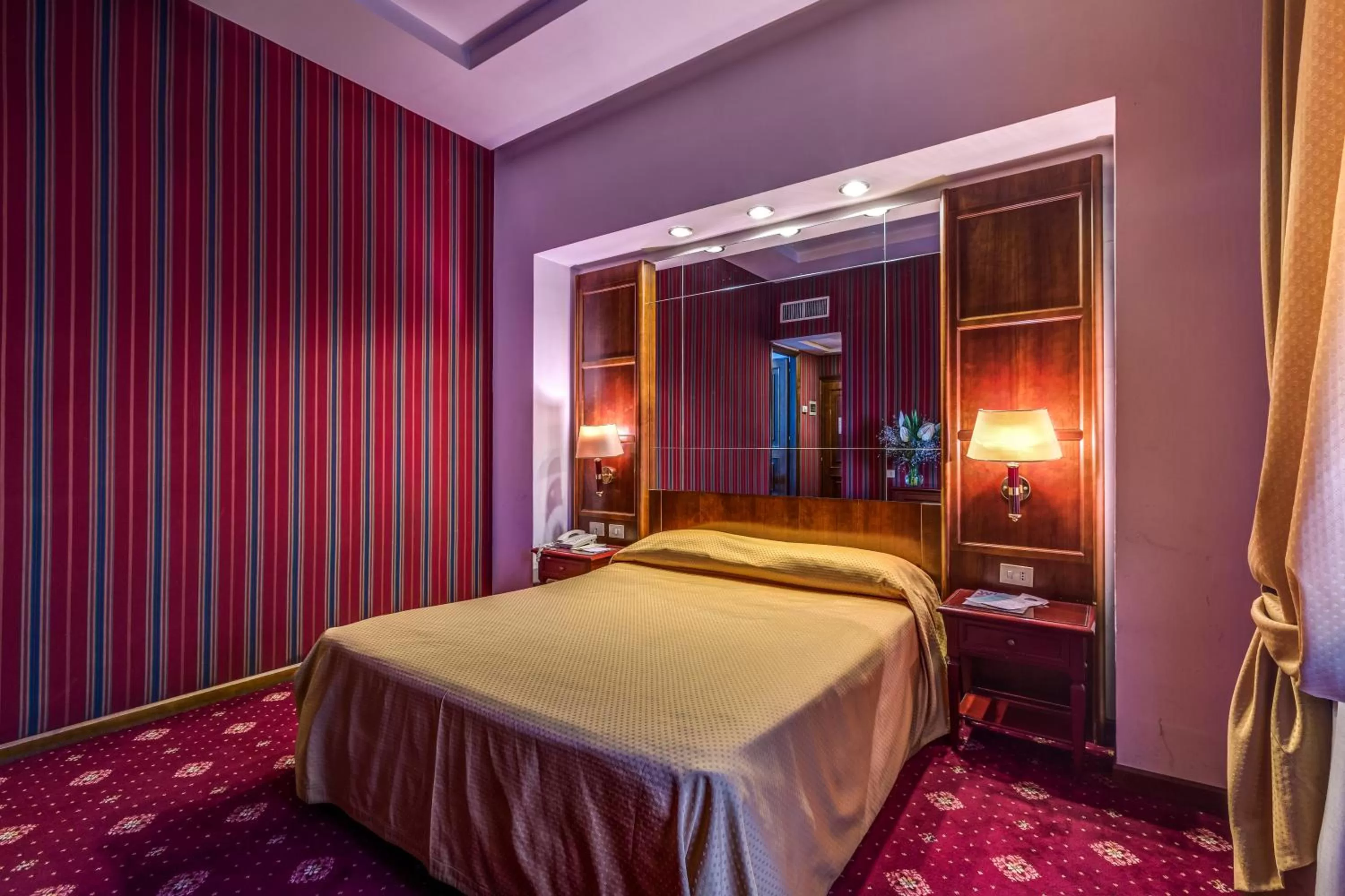 Bed in Atlante Garden Hotel