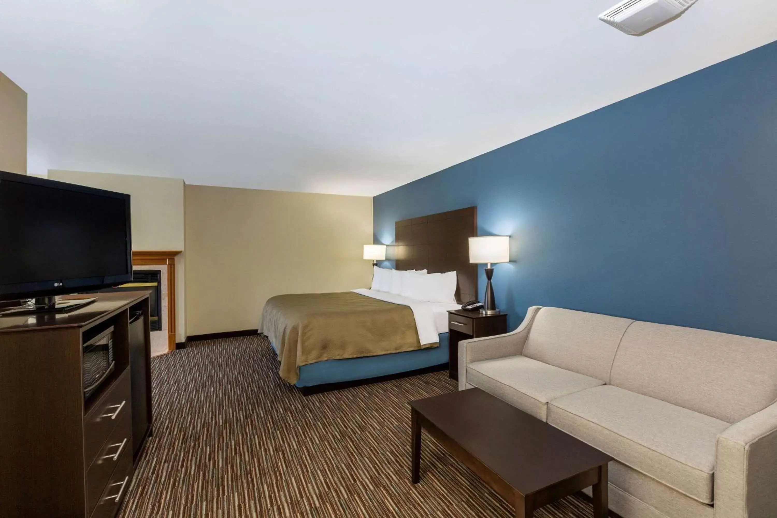 Photo of the whole room, TV/Entertainment Center in AmericInn by Wyndham Jefferson