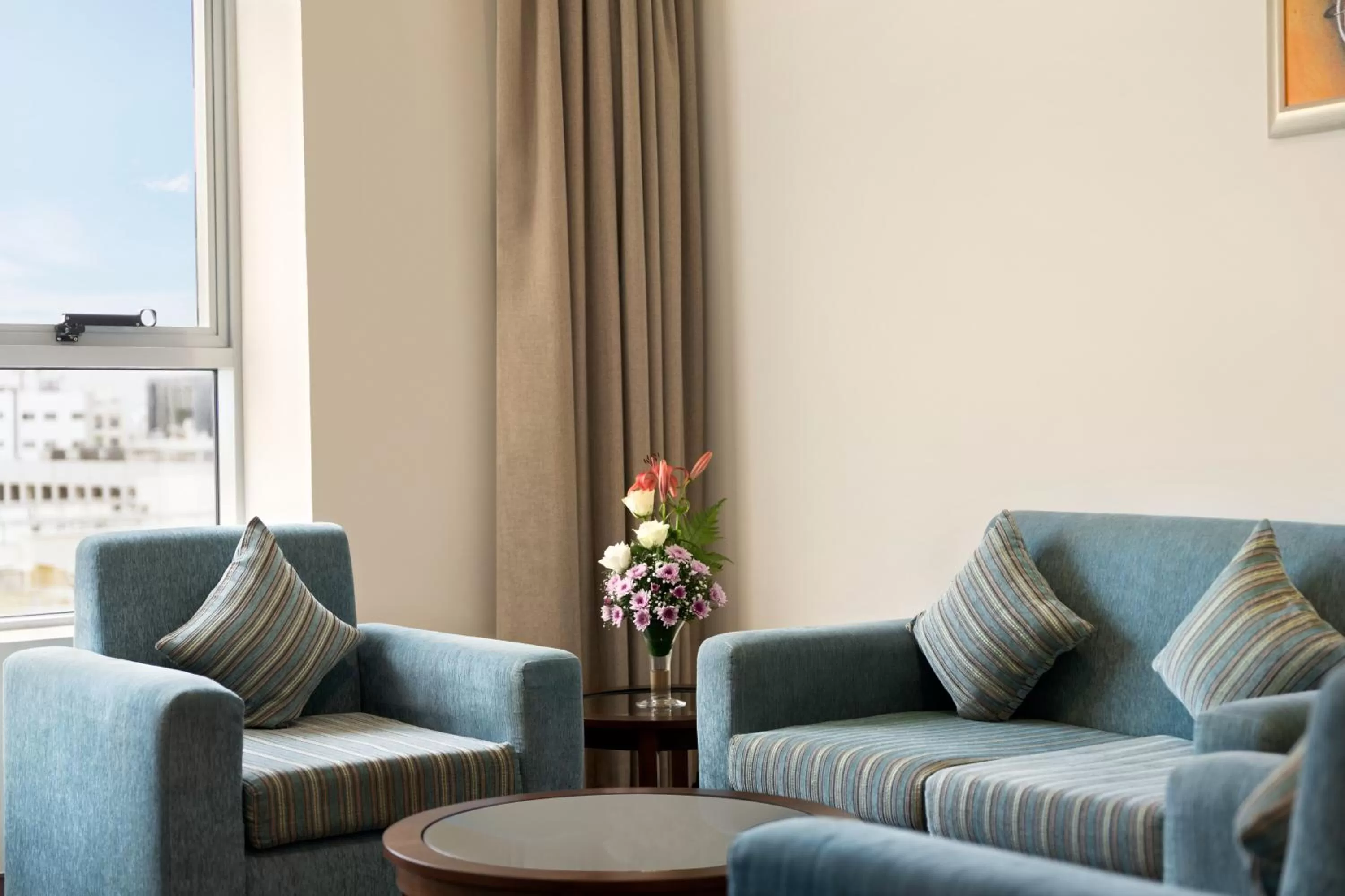 Living room in Ramada by Wyndham Dubai Deira