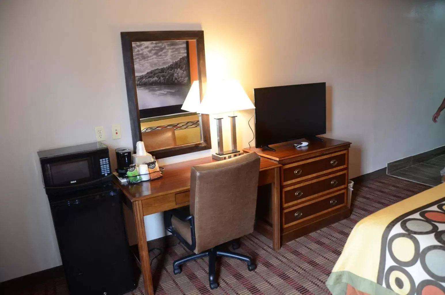 Bedroom, TV/Entertainment Center in Super 8 by Wyndham Louisville/Expo Center