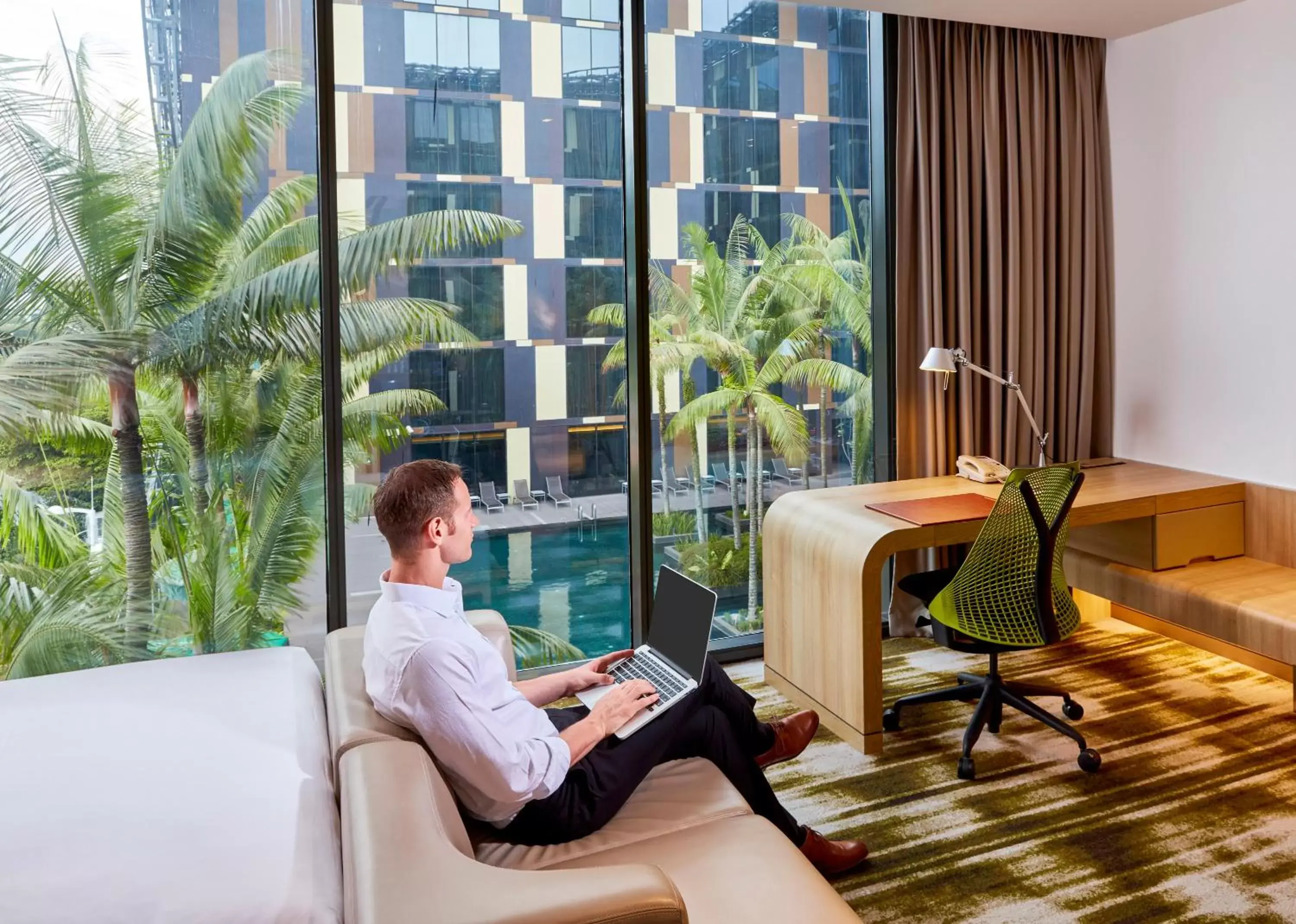 Bed in Crowne Plaza Changi Airport, an IHG Hotel