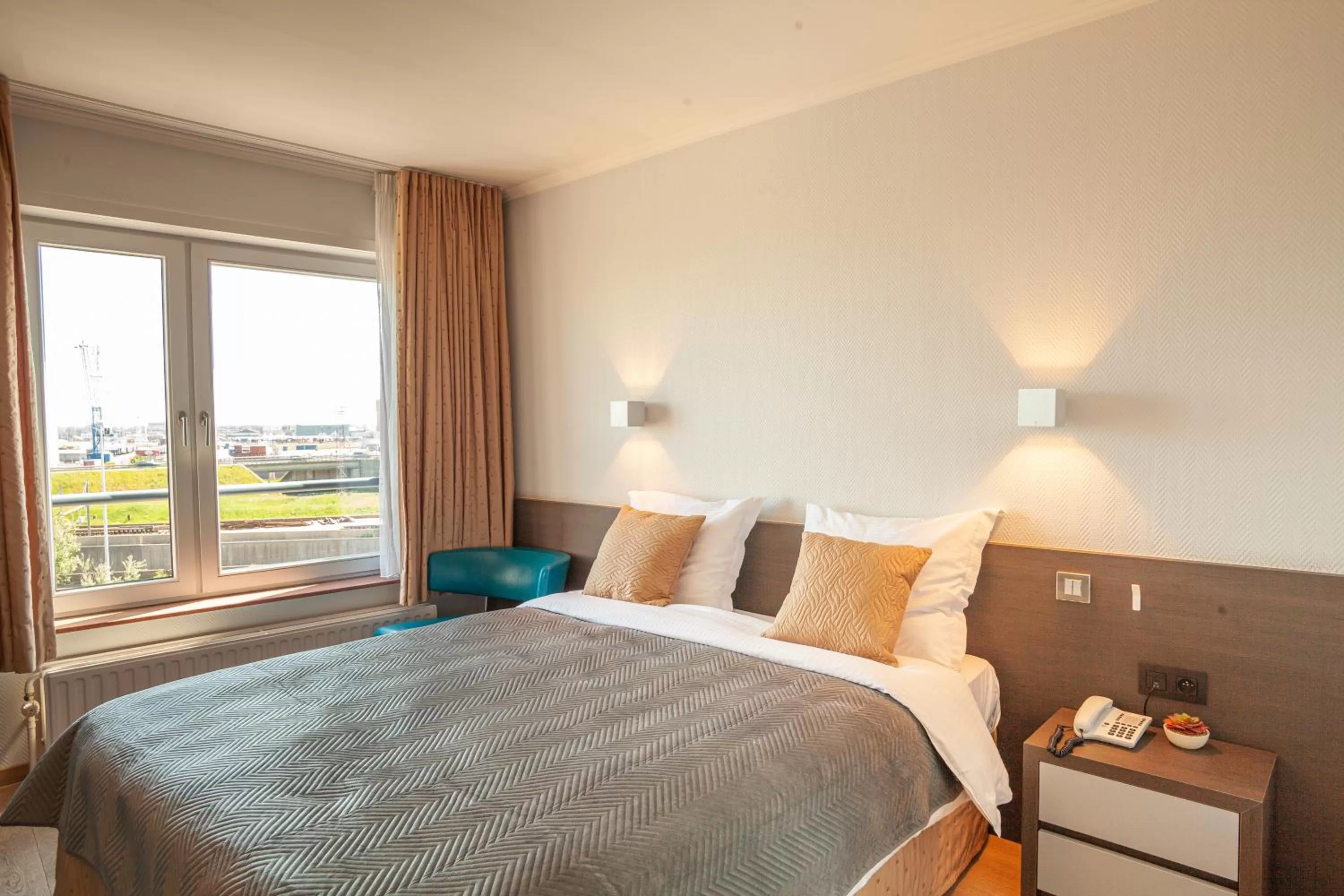 Bed in Hotel Monaco Zeebrugge Beach by Rikas Hotels